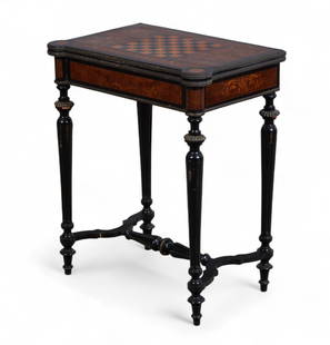An Continental gilt metal mounted inlaid and parcel ebonized foldtop games table, Late 19th century: An Continental gilt metal mounted inlaid and parcel ebonized foldtop games tableLate 19th centuryOpening to a green felt playing surface.height 28 1/4in (70.5cm); width 24in (60cm); width opened 30 1/