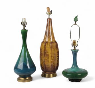 A group of three mid-century glazed ceramic table lamps: A group of three mid-century glazed ceramic table lampsLargest: height 27 x width 8 in. (68.6 x 20.3 cm.)