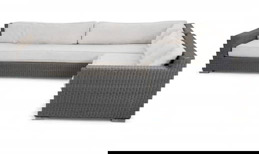 a large contemporary outdoor woven L-shaped sectional sofa: a large contemporary outdoor woven L-shaped sectional sofalarger section: height 27in (69cm); length 120in (305cm); depth 38in (97cm)