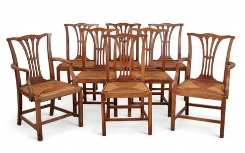 A Set of eight Hepplewhite Style Dining Chairs: A Set of eight Hepplewhite Style Dining ChairsComprising six side chairs and two armchairs, each with a shield-form back and pierced splat above a handwoven rush seats.