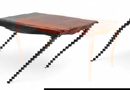A Louis XV style provincial fruitwood table: A Louis XV style provincial fruitwood tableThe rectangular top with serpentine edge above a shaped apron, raised on slender cabriole legs. Stained in a walnut tone, with surface wear and rustic constr