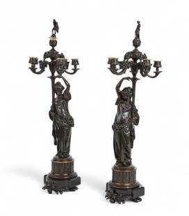 A pair of French patinated bronze six light candelabra modeled as Classical maidens: A pair of French patinated bronze six light candelabra modeled as Classical maidenslate 19th/early 20th centuryheight 29in (72.5cm); diameter 9 1/2in (24cm) Provenance:Property from the Private Colle