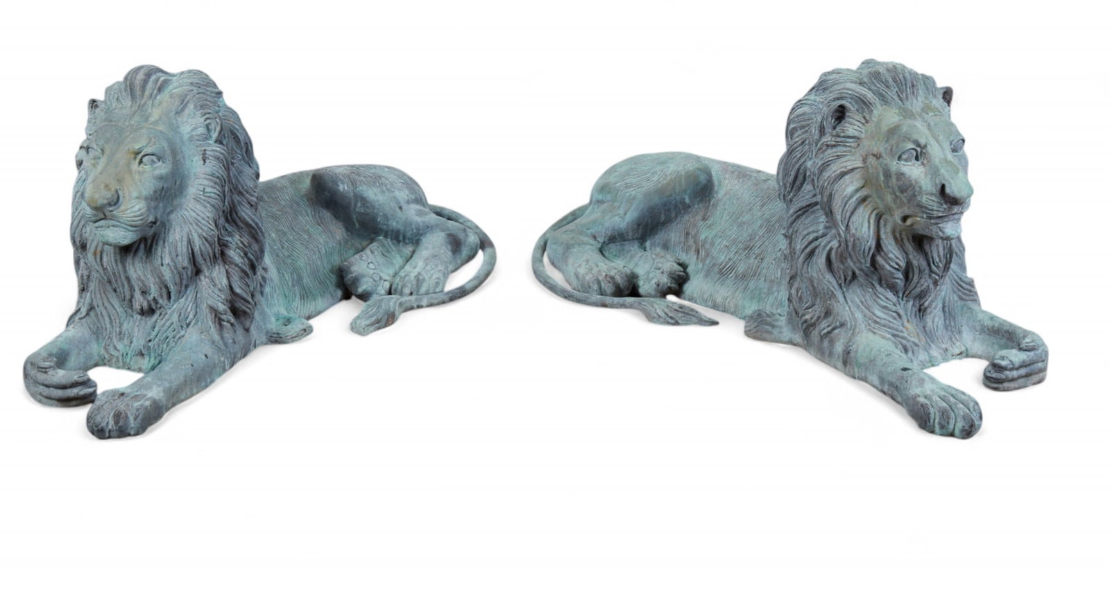 A pair of verdigris patinated bronze models of recumbent lions, post 1950 (1 of 8)