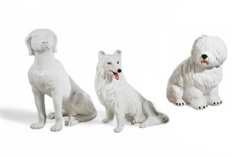 Three glazed ceramic models of seated dogs, modern: Three glazed ceramic models of seated dogsmodernlargest height 22in (56cm); width 10in (25.5cm); depth 16 1/2in (42cm)