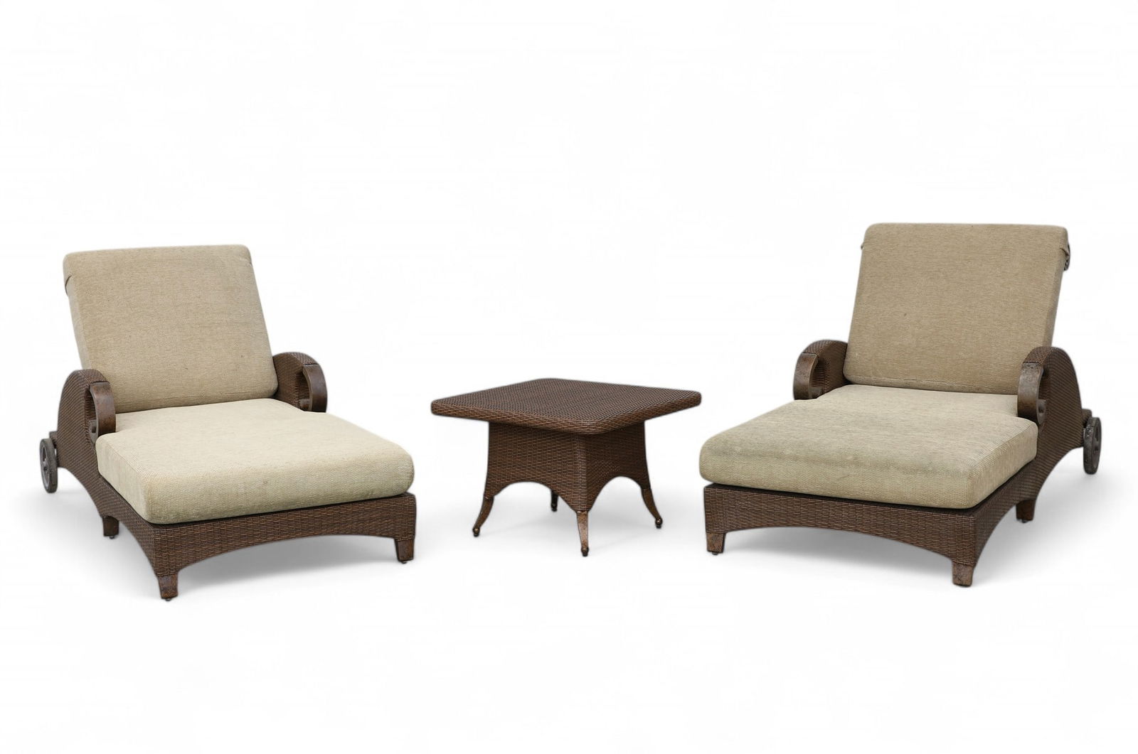 A group of "Cast Classics" outdoor chaises lounges with custom made cushions and square side table: A group of "Cast Classics" outdoor chaises lounges with custom made cushions and square side table Chaise Lounge: height 39 x length 80 x width 35 in. (99.1 x 203.2 x 88.9 cm.)