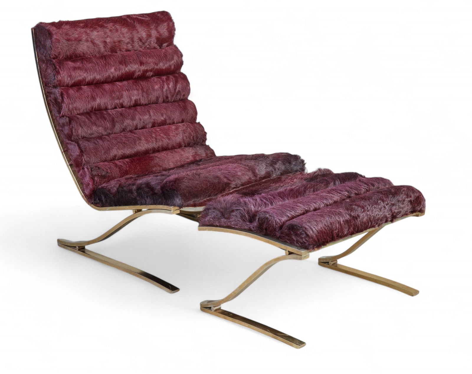 A two part chaise lounge by Design Institute America with faux fur upholstery and gold colored legs: A two part chaise lounge by Design Institute America with faux fur upholstery and gold colored legs Chair: height 36 x width 28 x depth 34 in. (91.4 x 71.1 x 86.4 cm.)