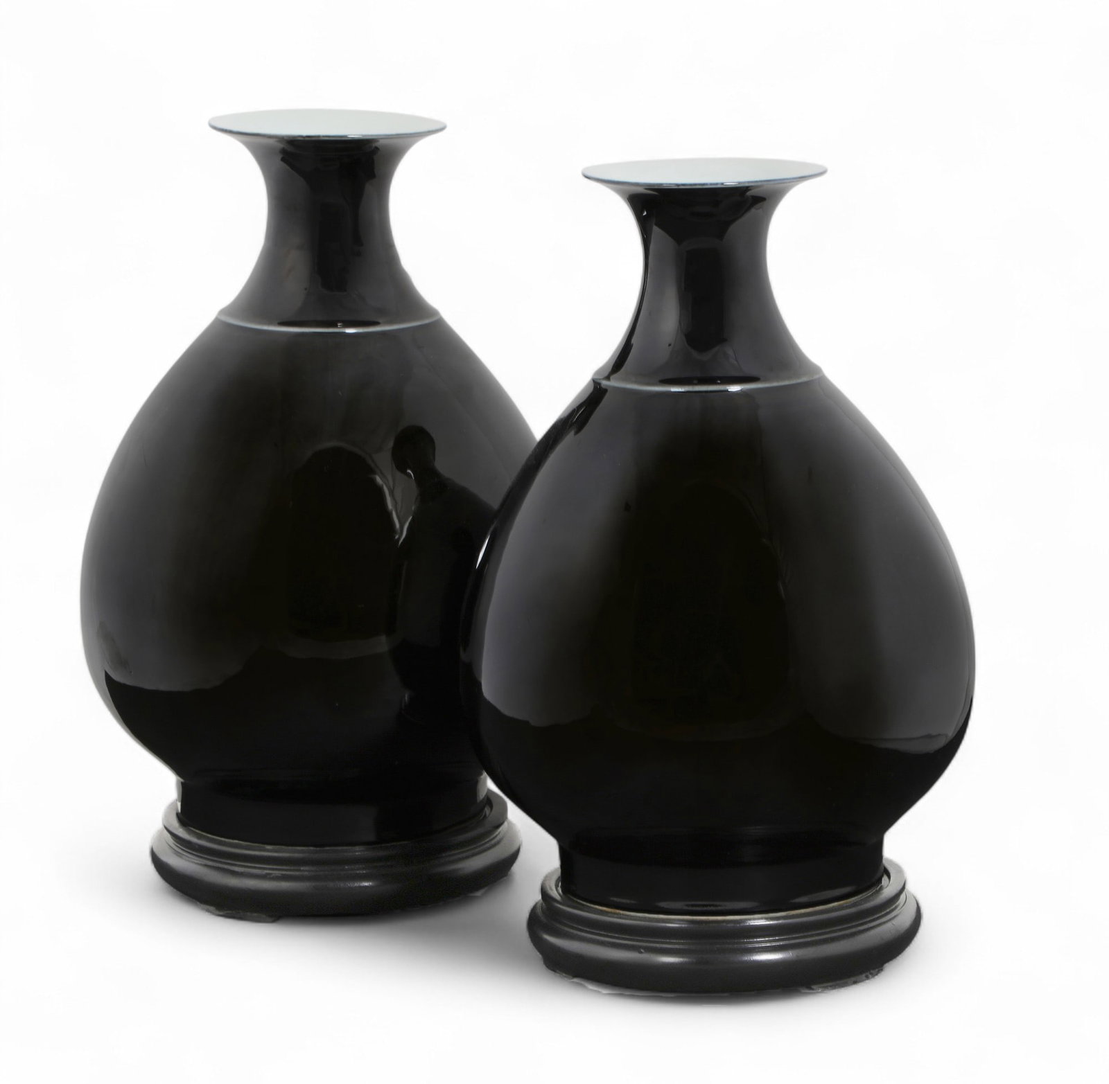 A pair of Chinese black glazed porcelain pyriform vases (1 of 3)