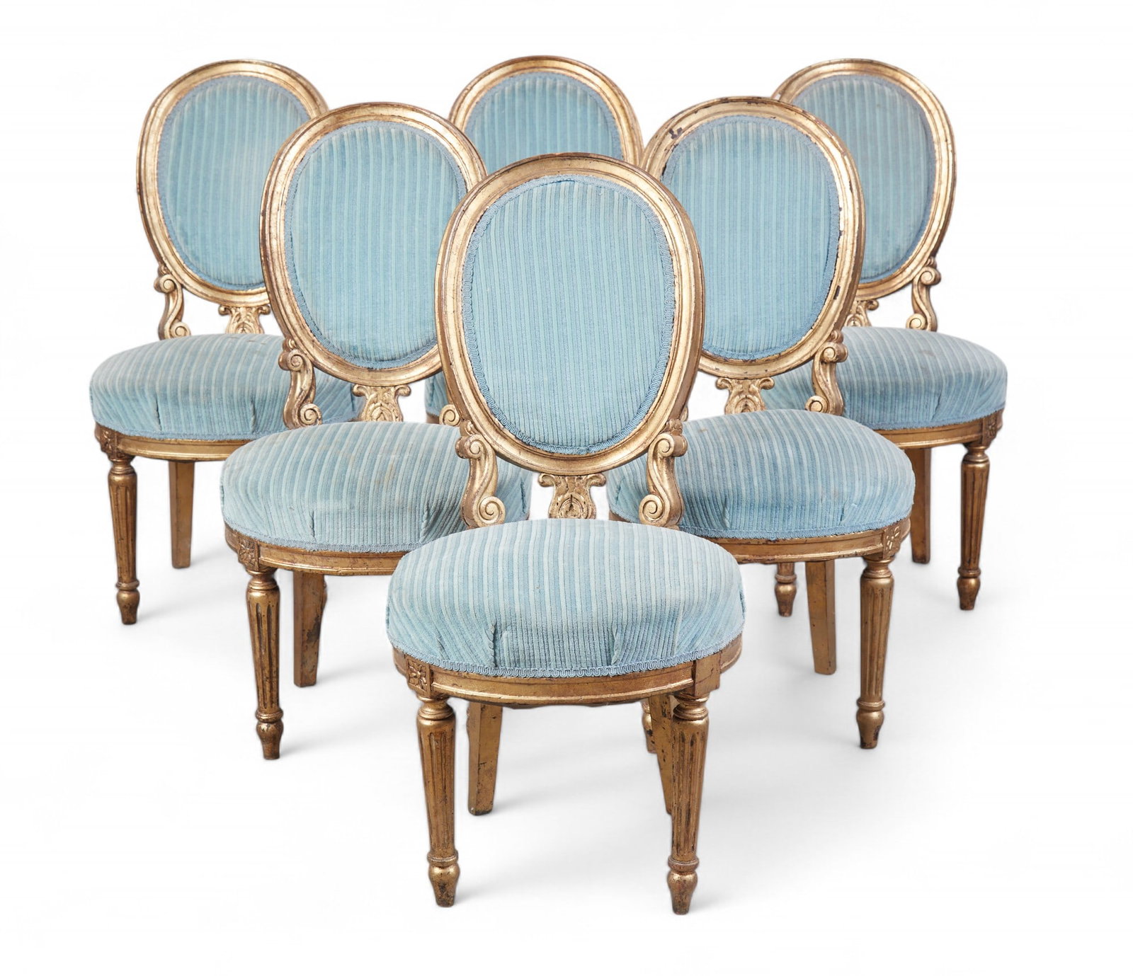 A set of six Louis XVI style giltwood chaises, circa 1900: A set of six Louis XVI style giltwood chaisescirca 1900height 38in (97cm); width 18 1/2in (47cm); depth of seat 17in (43cm) Provenance:Property from the Private Collection of Larry Bond, Utah.