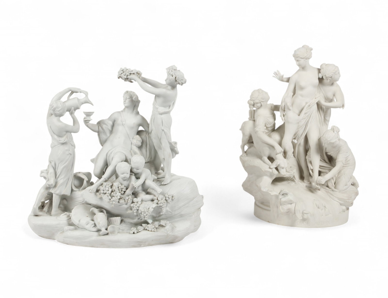Two French bisque porcelain figural groups: The Triumph of Bacchus & Diana at the Bath: Two French bisque porcelain figural groups: The Triumph of Bacchus & Diana at the BathSevres and another maker20th centuryOne incised DIANE Au BAIN to base and impressed SEVRES MANUFACTURE NATIONALE F