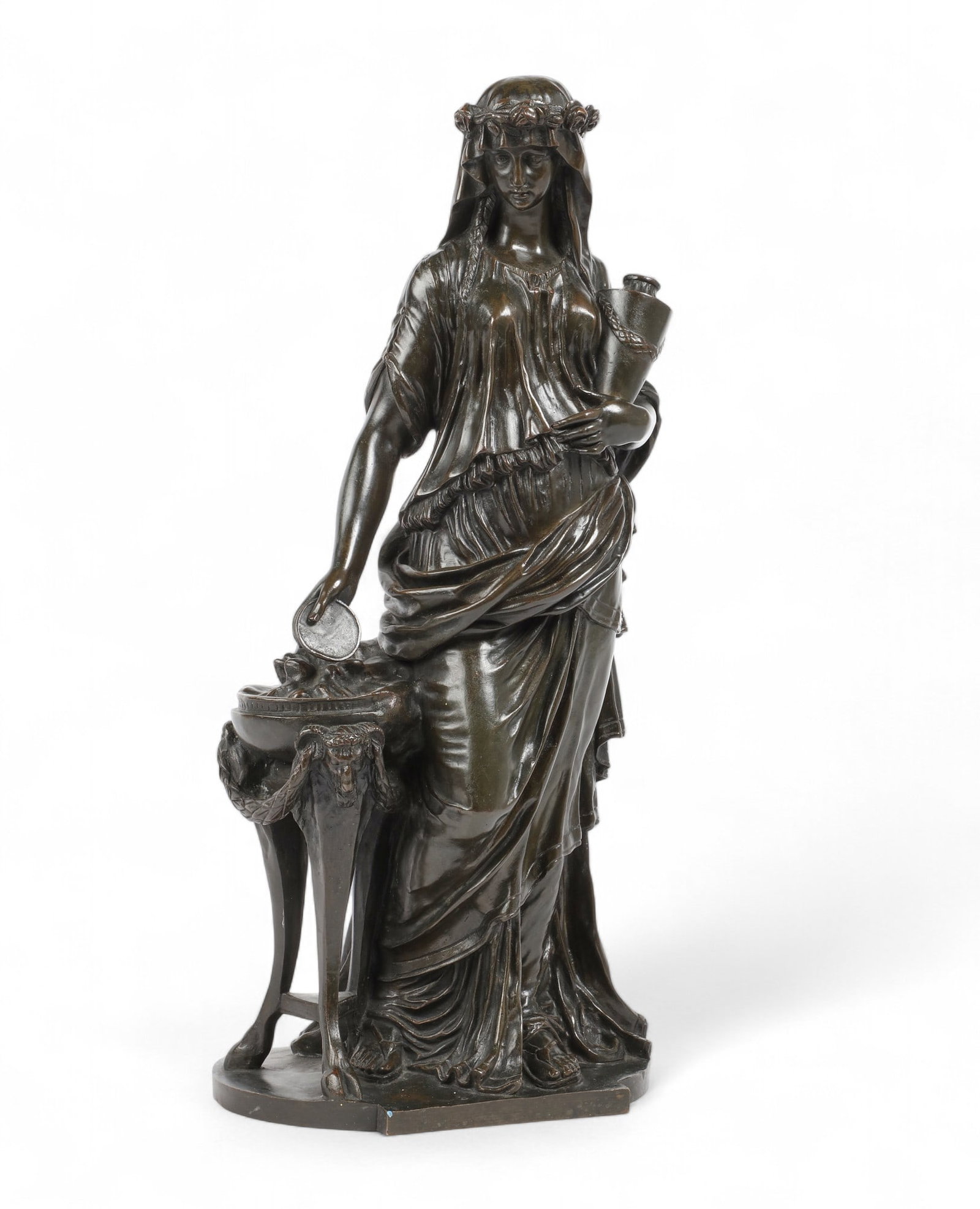 A French patinated bronze figure: The Vestal, after the model by Claude-Michel Clodion: A French patinated bronze figure: The Vestalafter the model by Claude-Michel Clodion (1738-1814)circa 1900height 21in (52.5cm); width 9 1/2in (24cm); depth 7in (17.5cm) Provenance:Property from