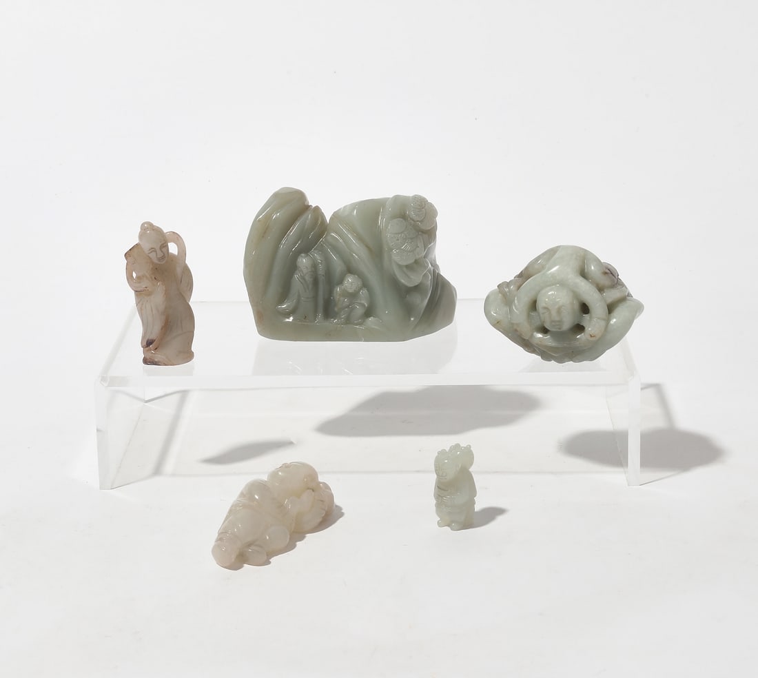 A collection of five Chinese hardstone and jade figural carvings (1 of 2)