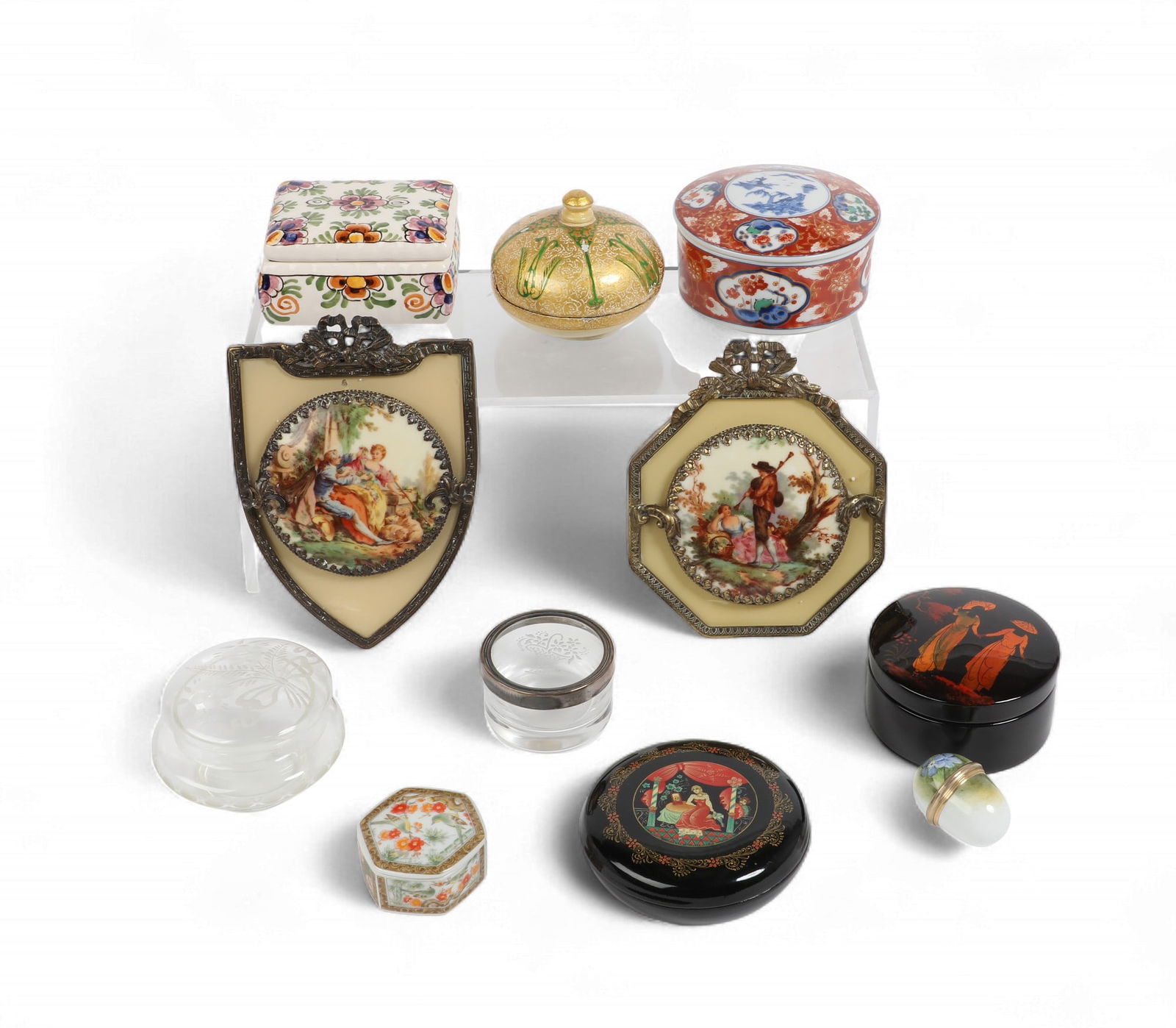 A group of nine table boxes together with a pair of metal mounted porcelain plaques (1 of 4)