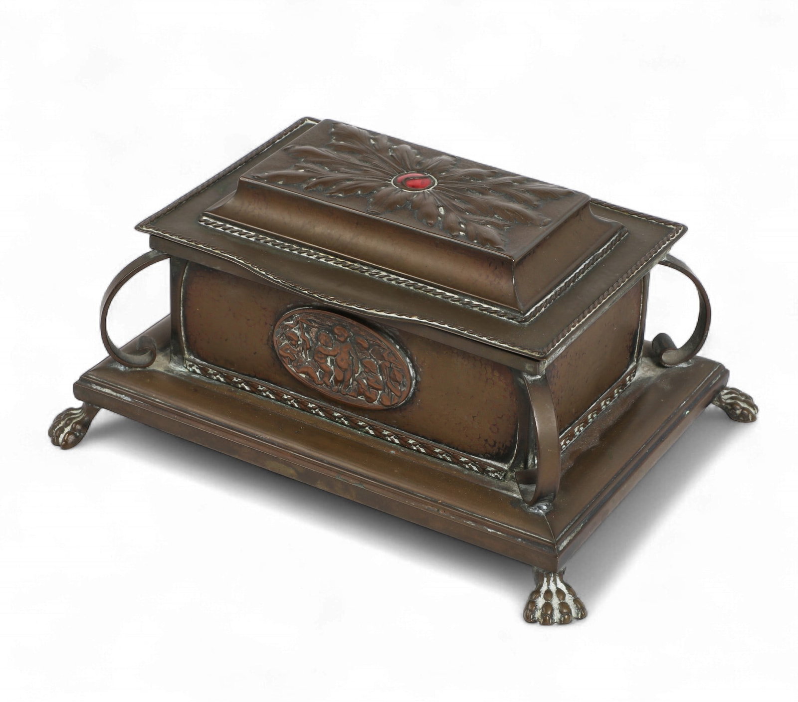 An art deco style metal casket: An art deco style metal casket height 5 x width 9 1/2 x depth 7 1/2 in. (12.7 x 24.1 x 19.1 cm.)