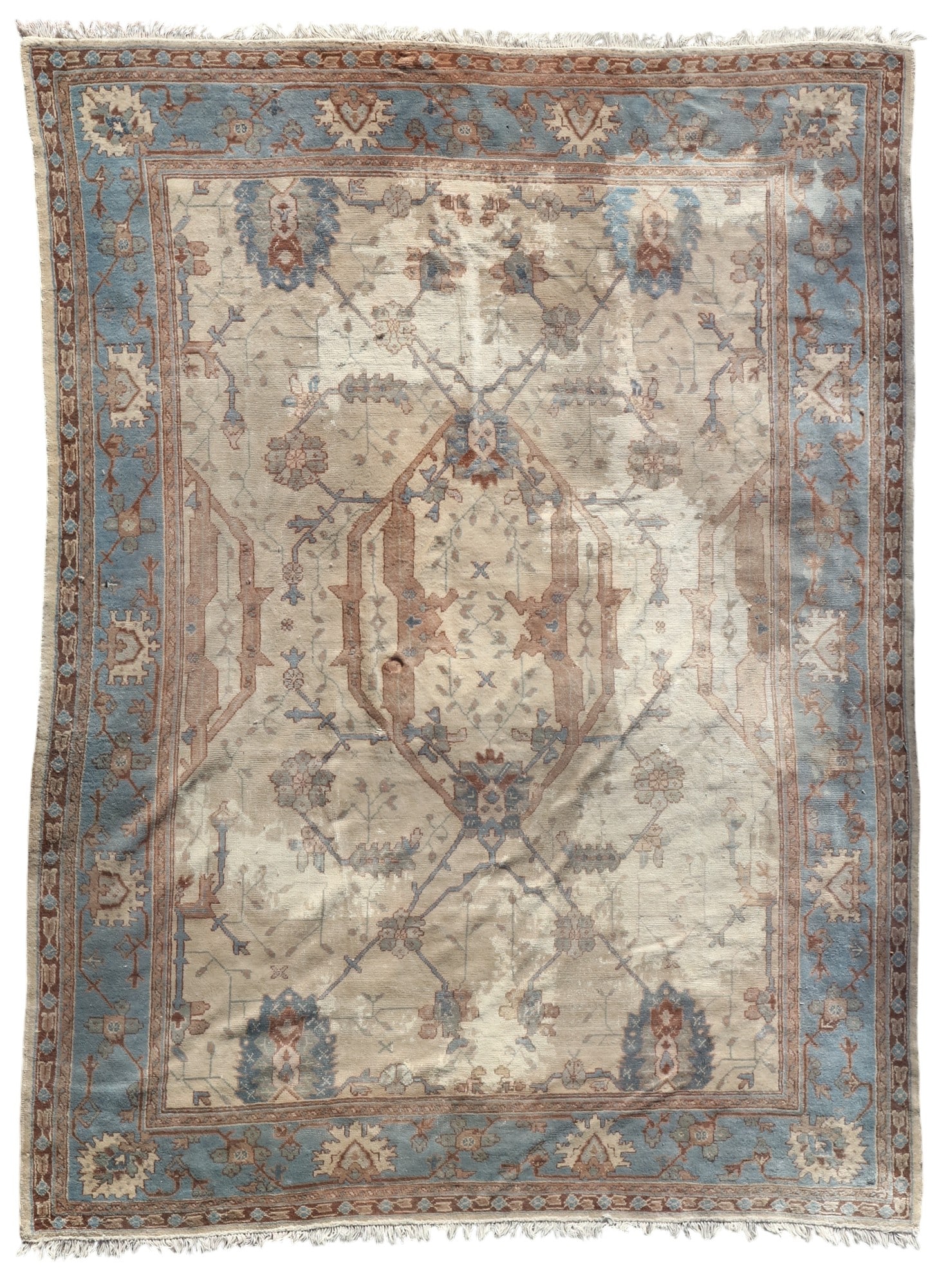 A Persian Heriz rug featuring a central medallion and stylized floral motifs, blue border: A Persian Heriz rug featuring a central medallion and stylized floral motifs, blue border 13ft x 10ft (398.8 x 307.3 cm.)