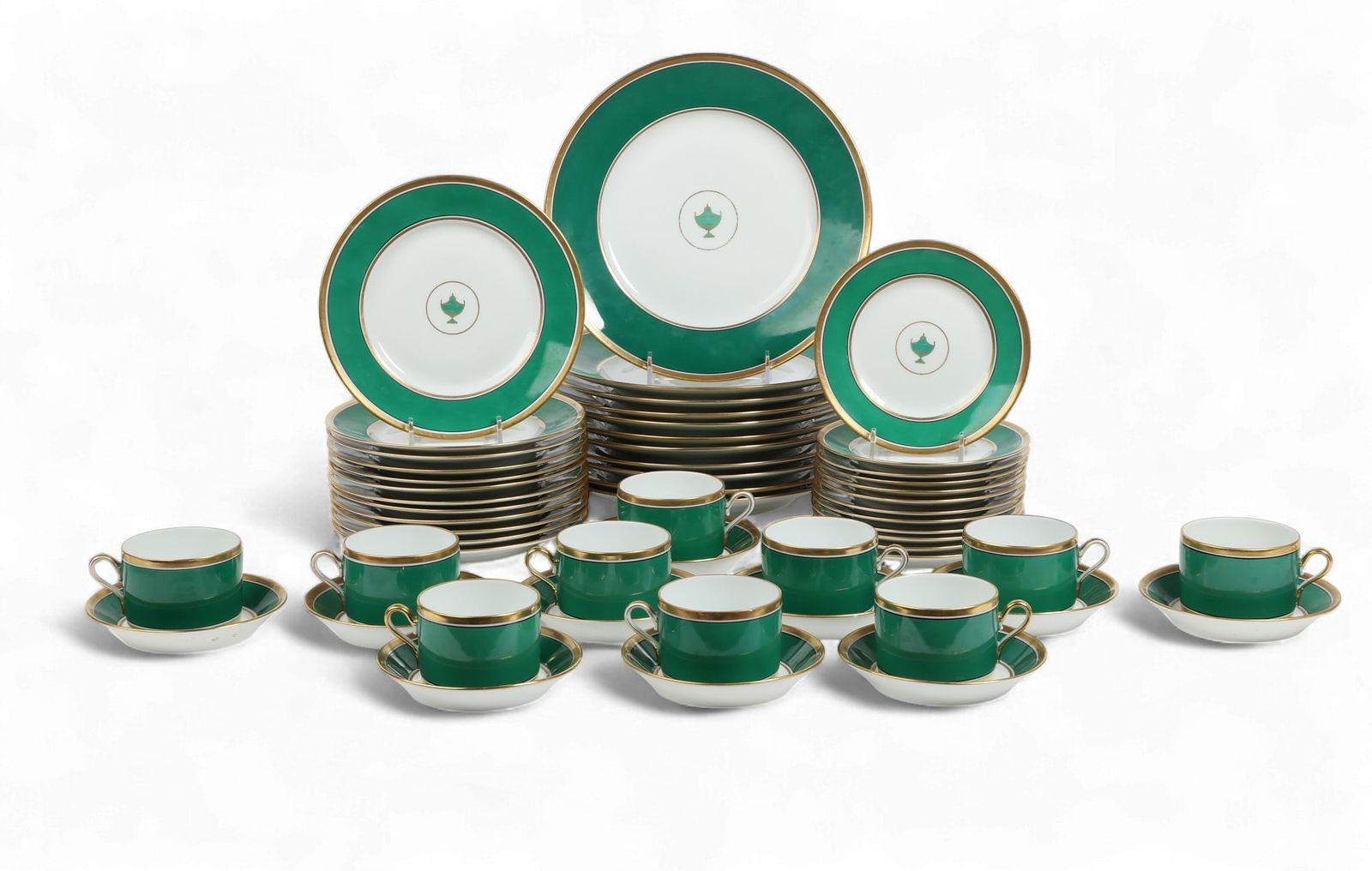A 'Richard Ginori' Impero green fifty-five piece dinner service, (55): A 'Richard Ginori' Impero green fifty-five piece dinner service(55)consisting of eleven 10 in. dinner plates, twelve 8 in. salad plates, twelve 6 in. bread and butter plates, ten cup and saucersDinner