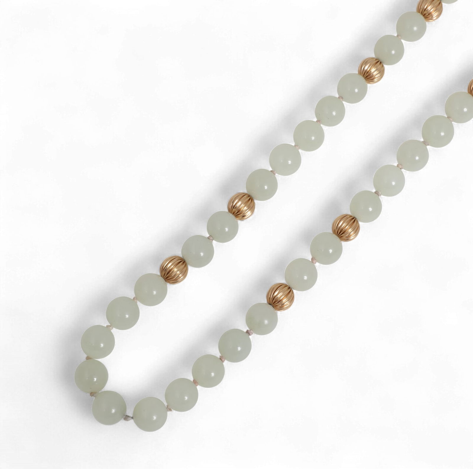 A 14K yellow gold and jadeite bead necklace (1 of 3)