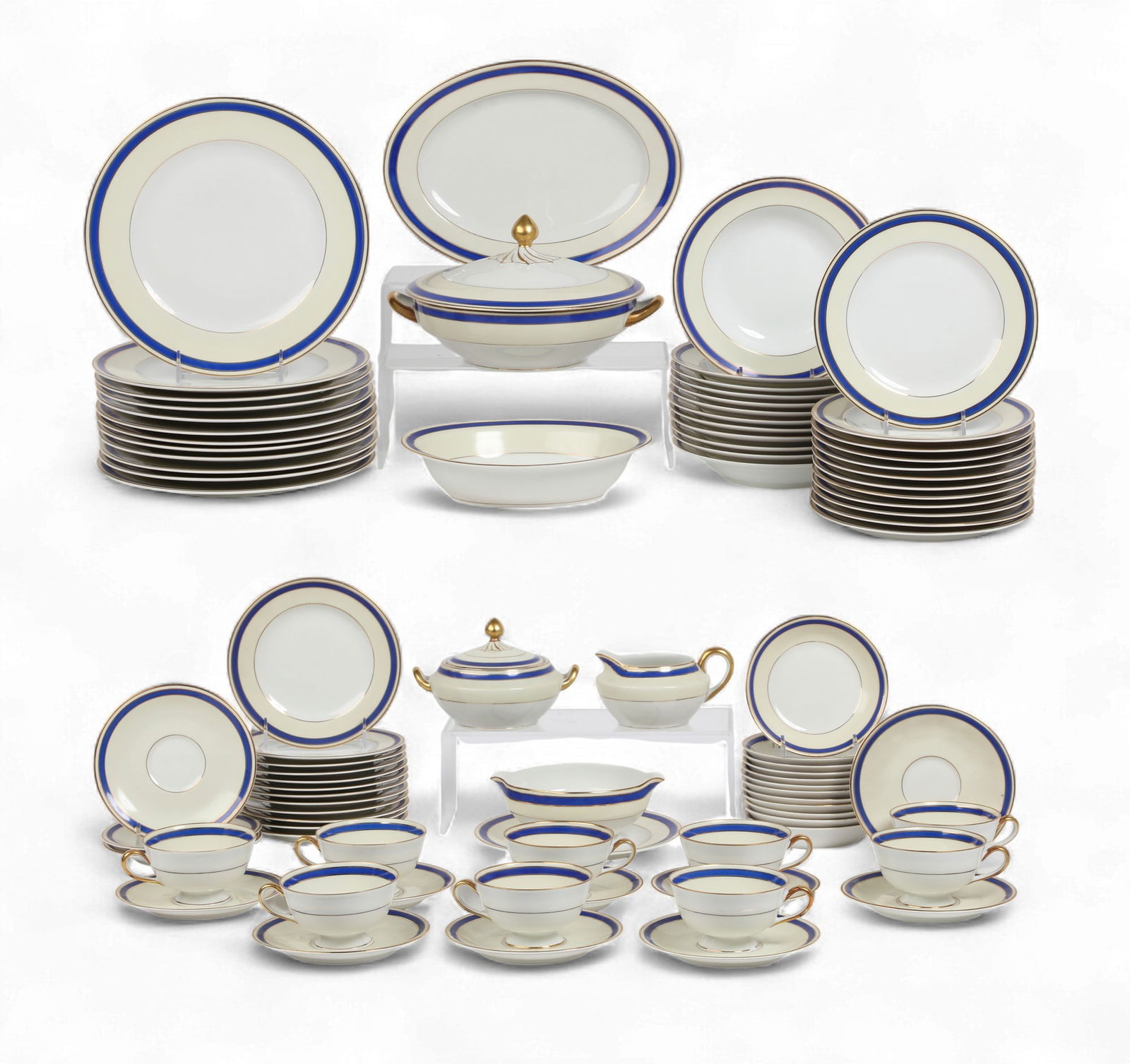 A Limoges porcelain part dinner service, Charles Ahrenfeld, mid 20th century: A Limoges porcelain part dinner serviceCharles Ahrenfeldmid 20th centuryComprising 12 (10 1/4in) dinner plates, 12 (7 3/4in) soup bowls, 9 salad plates, 12 bread plates, 9 cups, 12 saucers, 12 (5 1/8i
