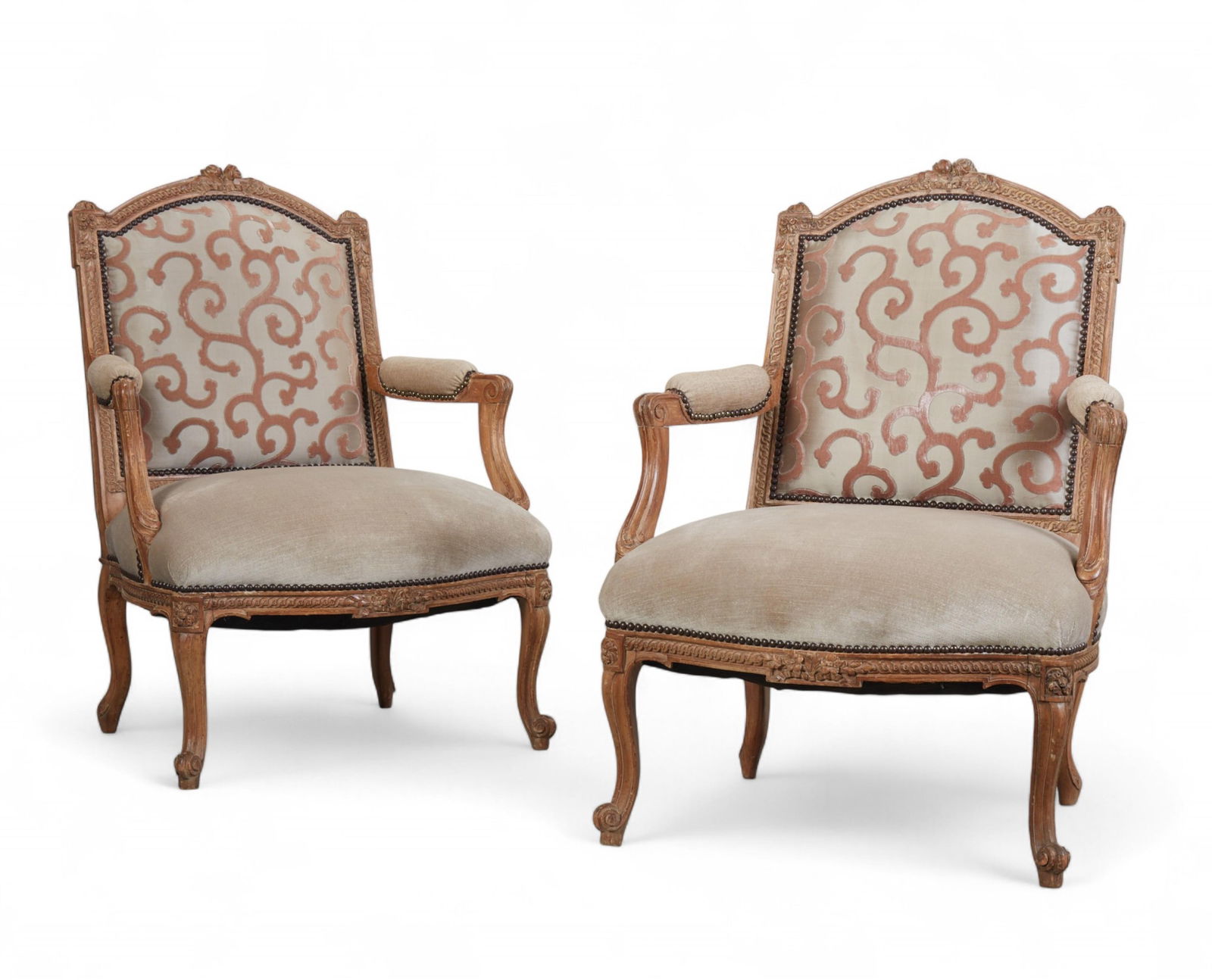 A pair of Louis XV/XVI Transitional style tan painted walnut fauteuils, 20th century (1 of 7)