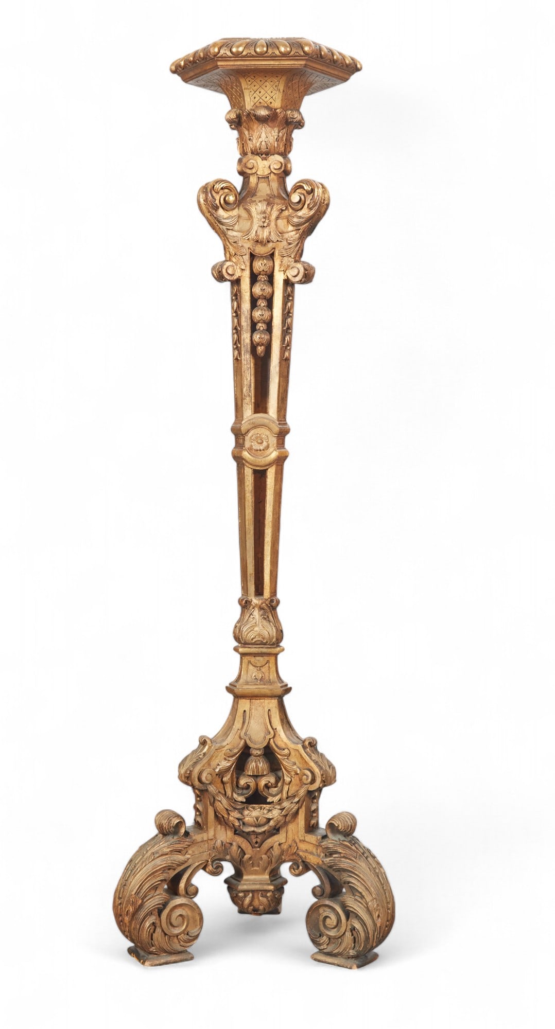 A Regence style giltwood torchere, early 20th century: A Regence style giltwood torchere early 20th century height 59in (150cm); diameter 18in (46cm) Provenance: Property from a Palm Springs Collection.