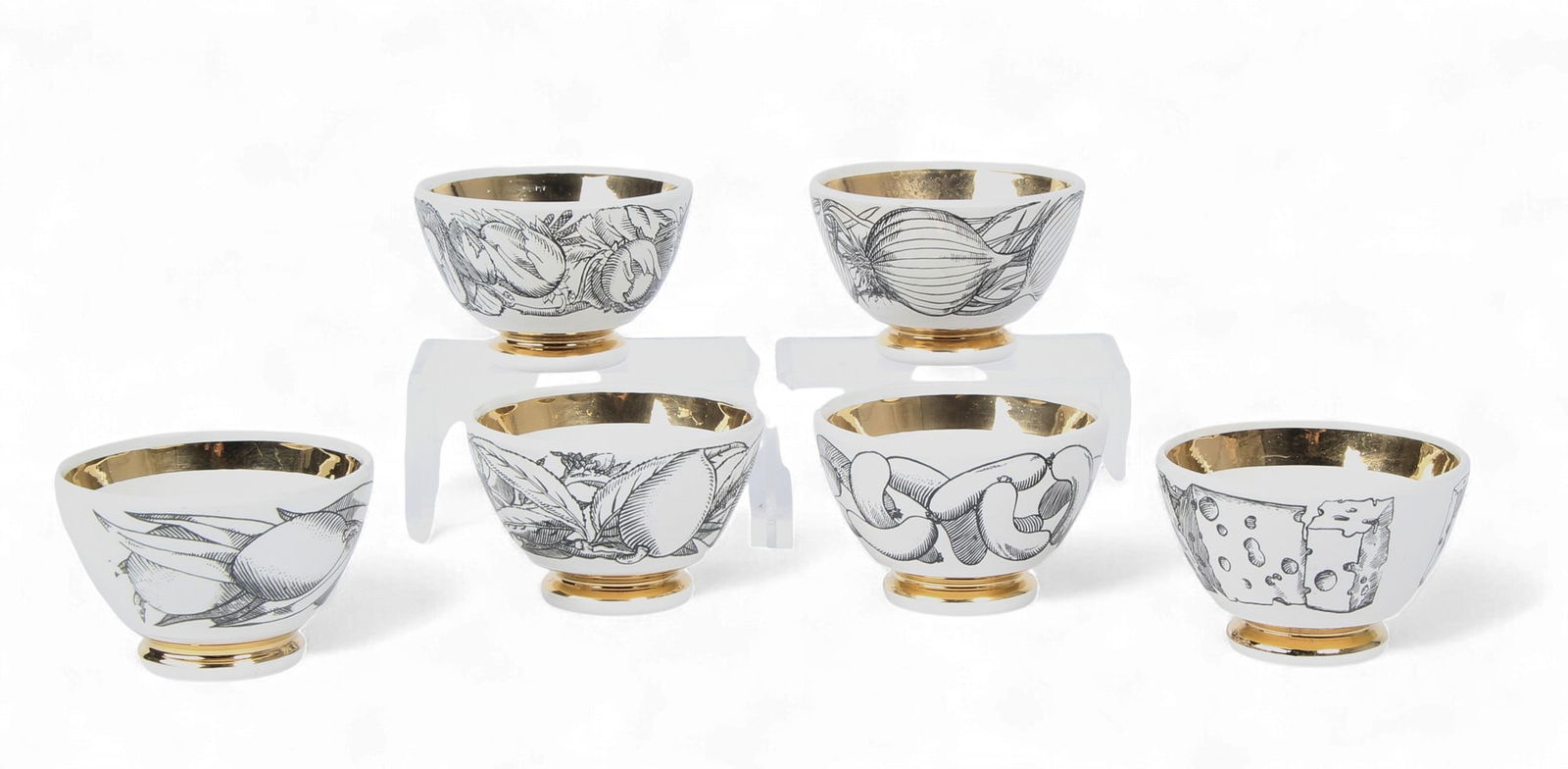 A set of six Piero Fornasetti ceramic appetizer bowls, third quarter 20th century: A set of six Piero Fornasetti ceramic appetizer bowlsthird quarter 20th centuryAll marked to undersides.height 2in (5cm); diameter 3 1/8in (8cm) Provenance:Property from a Private Collection, P
