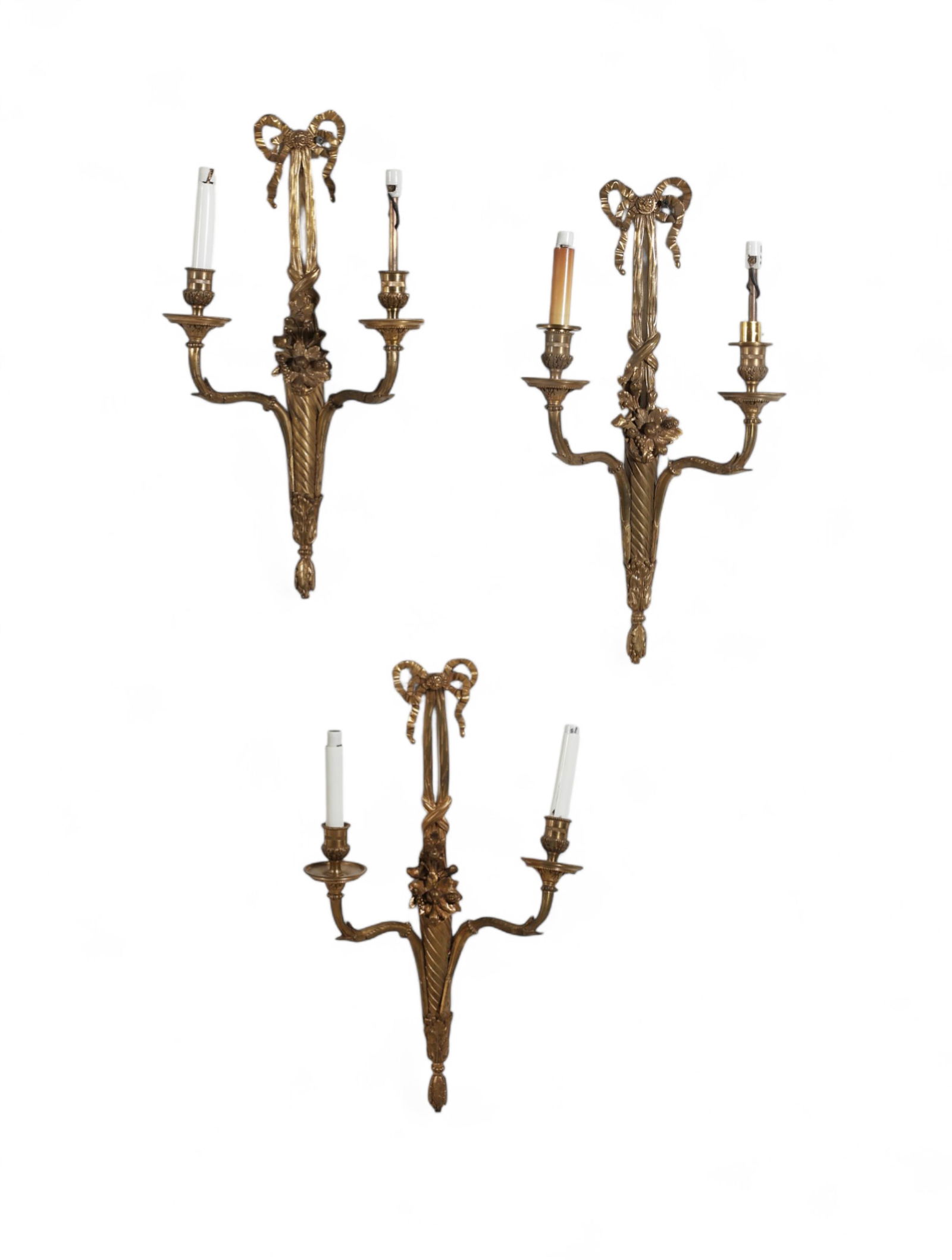 A set of three Louis XVI style gilt bronze two light wall sconces, early 20th century (1 of 4)