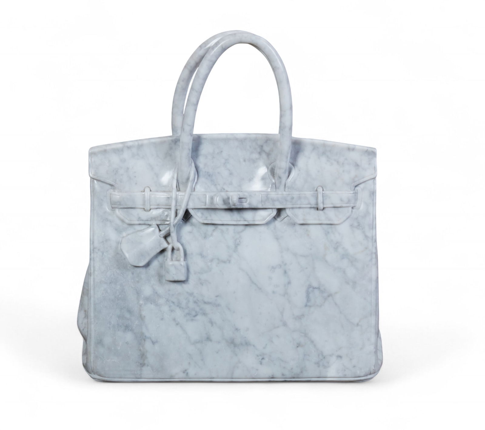 A Carrara marble model of a Birkin bag, modern: A Carrara marble model of a Birkin bagmodernIncised to reverse William David.height 20in (50cm); width 17in (42.5cm); depth 8 1/4in (20cm)