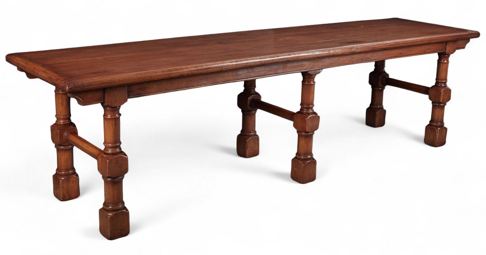 A Continental Baroque style walnut dining / refectory table, modern: A Continental Baroque style walnut dining / refectory tablemodernheight 32 1/2in (83cm); width 120in (305cm); depth 30in (76cm) Provenance:Property from the Collection of Lauren King.