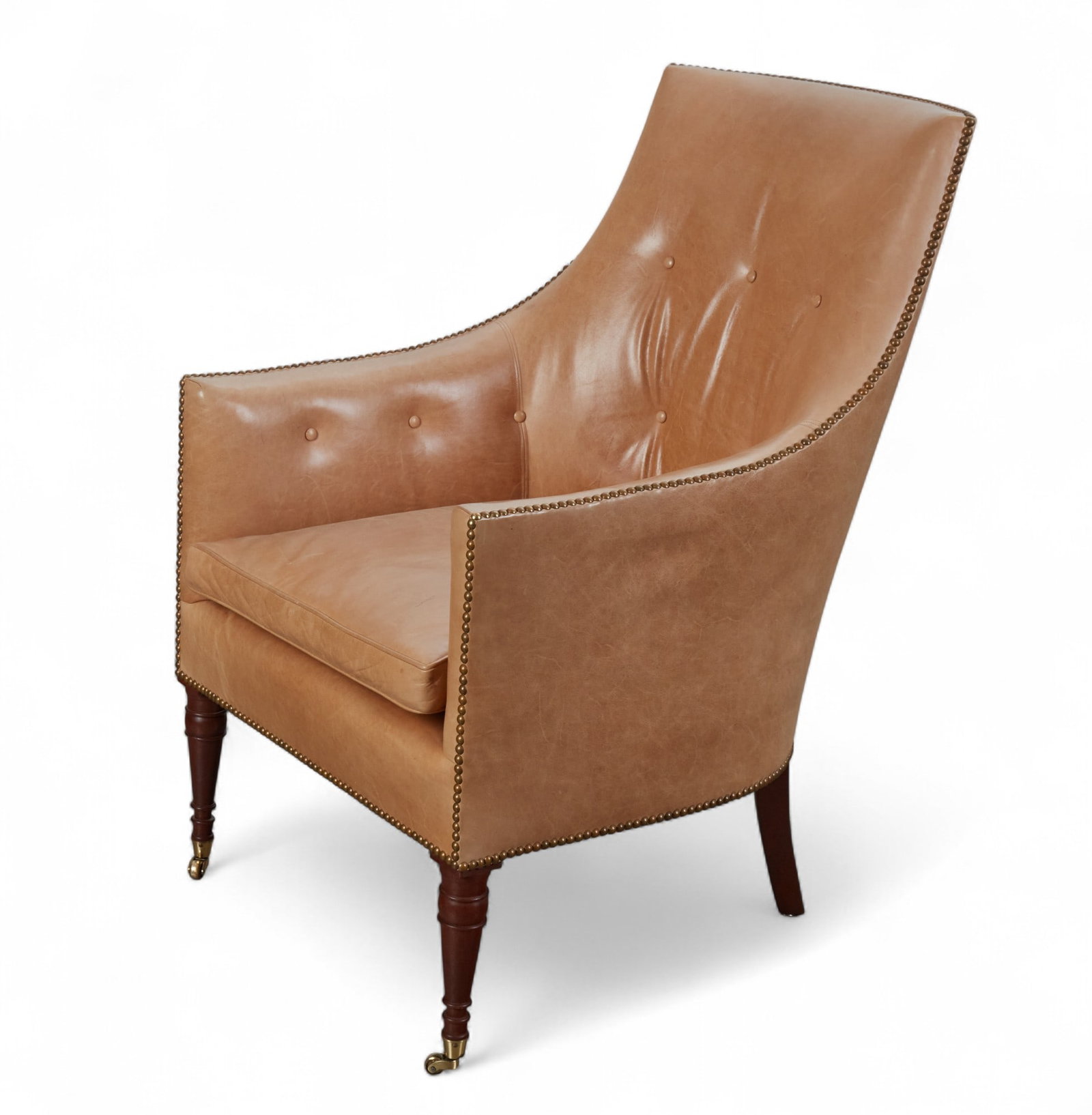 A George IV style close nailed tan leather upholstered Meade bergere, Bunny Williams, modern: A George IV style close nailed tan leather upholstered Meade bergereA. Schneller & Sons, Bunny WilliamsmodernWith maker s tag under seat cushion.height 40in (101.5cm); width 26in (66cm); depth of seat