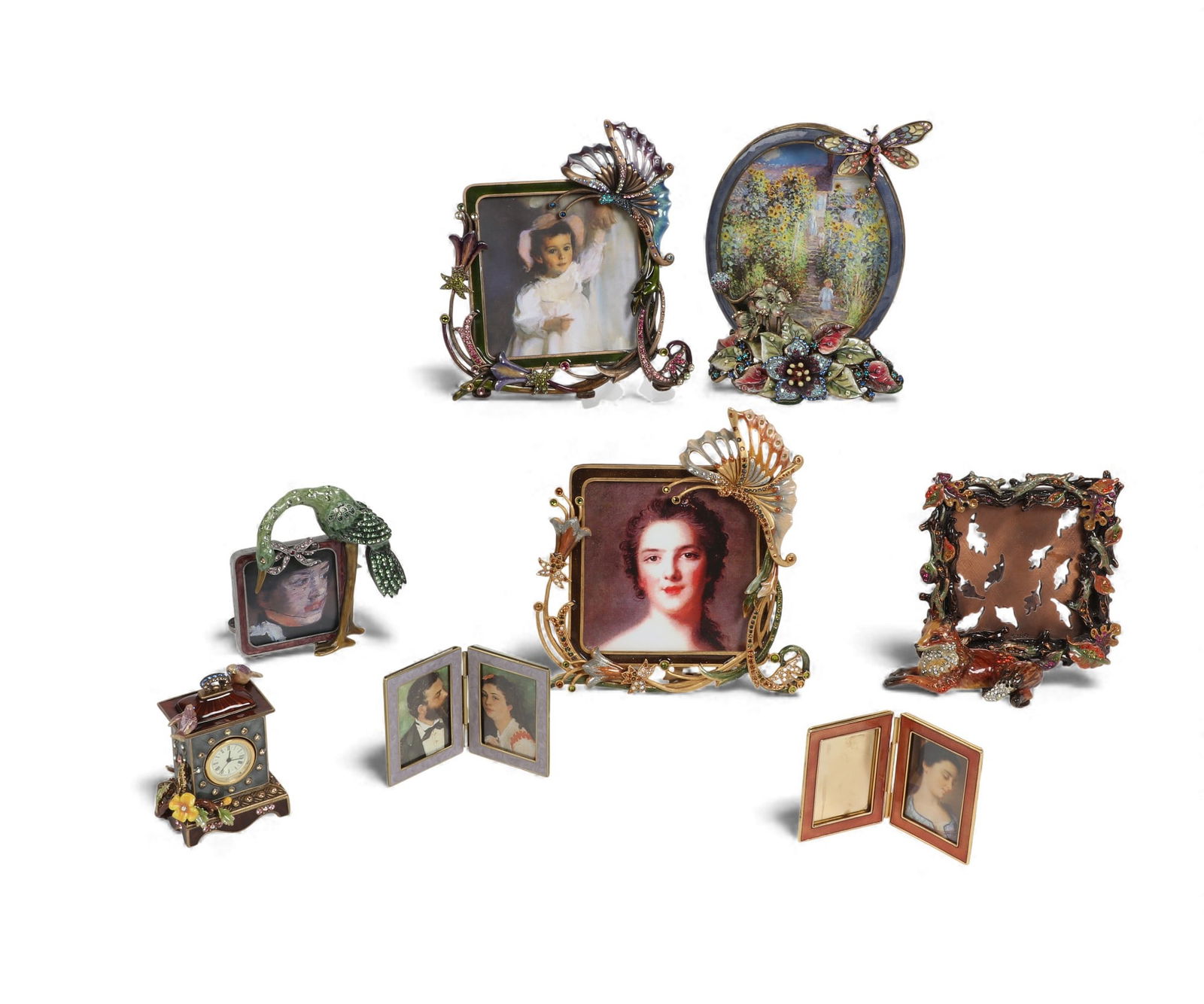 A group of seven Jay Strongwater jeweled enamel picture frames, modern: A group of seven Jay Strongwater jeweled enamel picture framesmodernIncluding two Art Nouveau style butterfly frames; Lorelei the fox frame; Ileana an oval flower base frame; and two folding travel fr