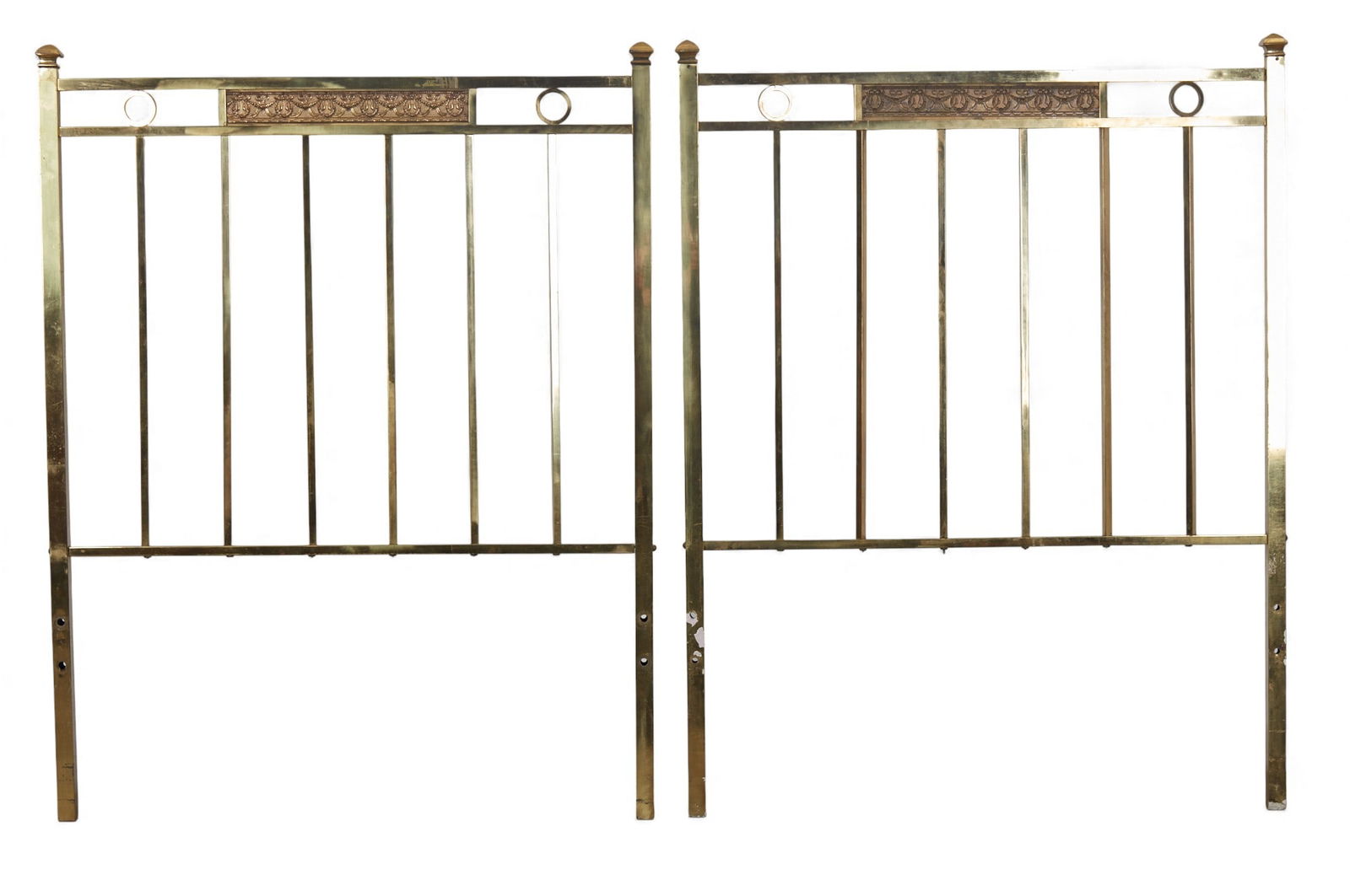 A pair of vintage brass headboards: A pair of vintage brass headboards height 51 x width 40 in. (129.5 x 101.6 cm.)