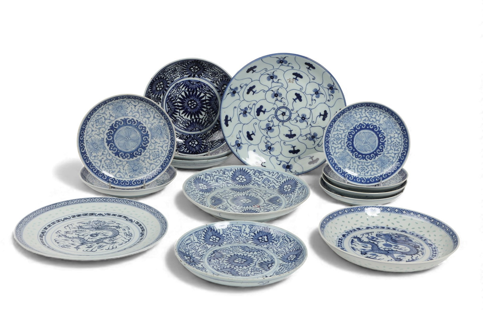 A group of fourteen assorted Chinese blue and white plates of various sizes: A group of fourteen assorted Chinese blue and white plates of various sizes diameter 10 1/2 in. (26.7 cm.)