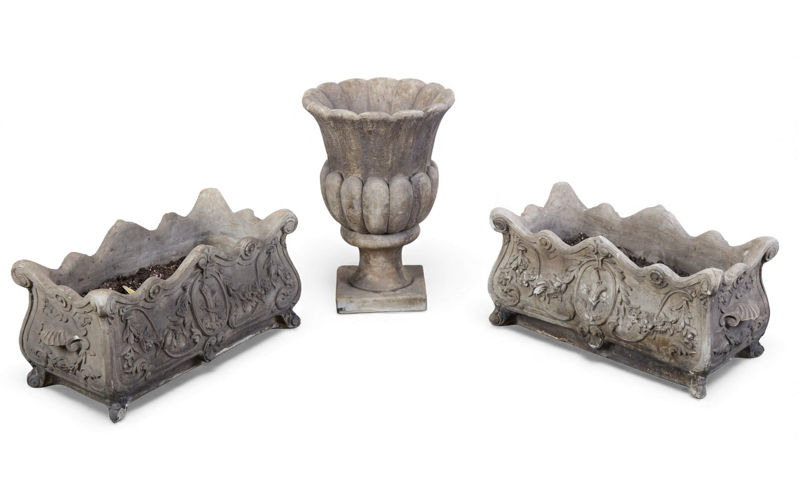 A group of three concrete planters: A group of three concrete planters Rectangular: 13 x 28 x 12 in. (33 x 71.1 x 30.5 cm.)