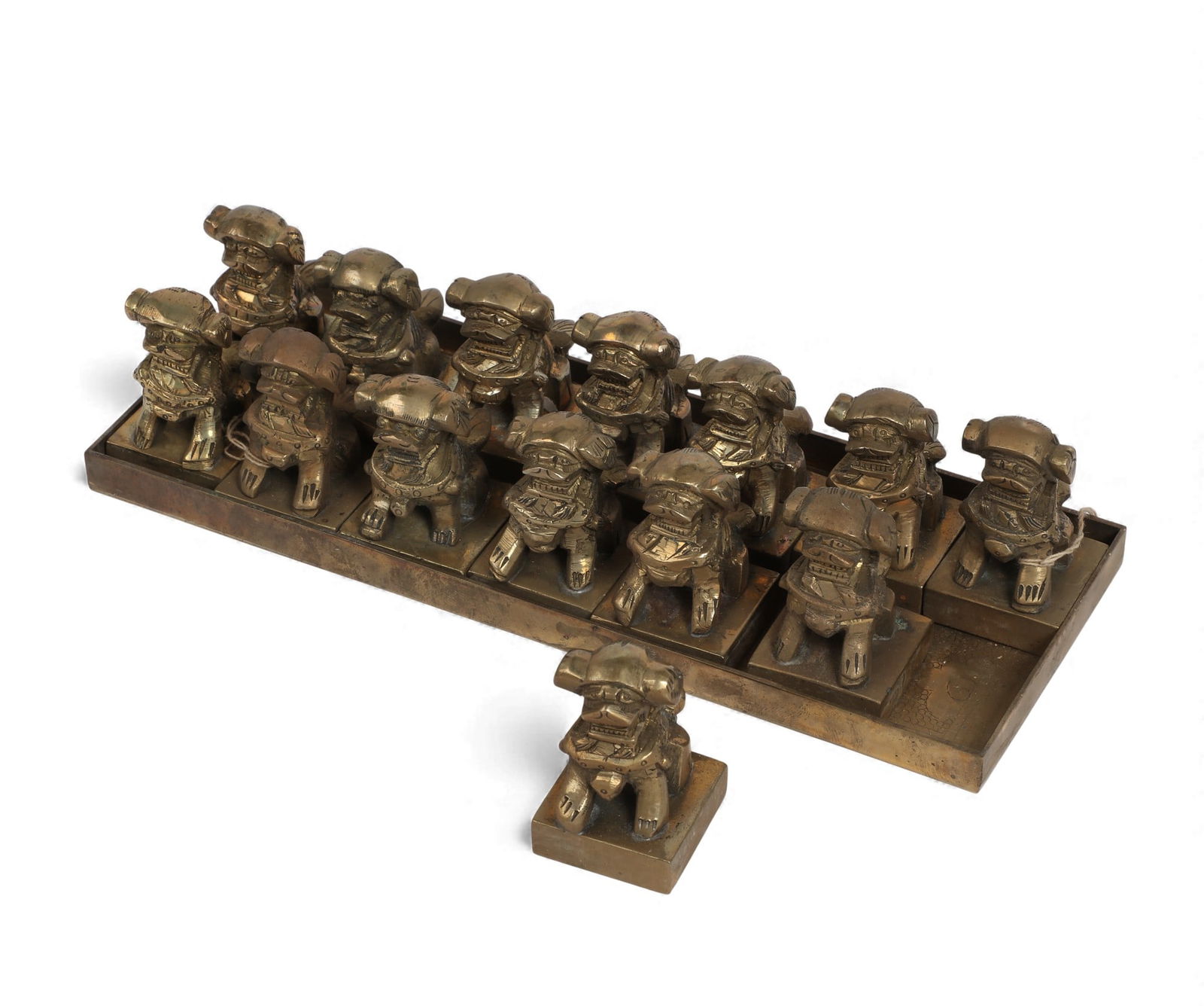 A group of fourteen Chinese brass foo dog seals (1 of 3)