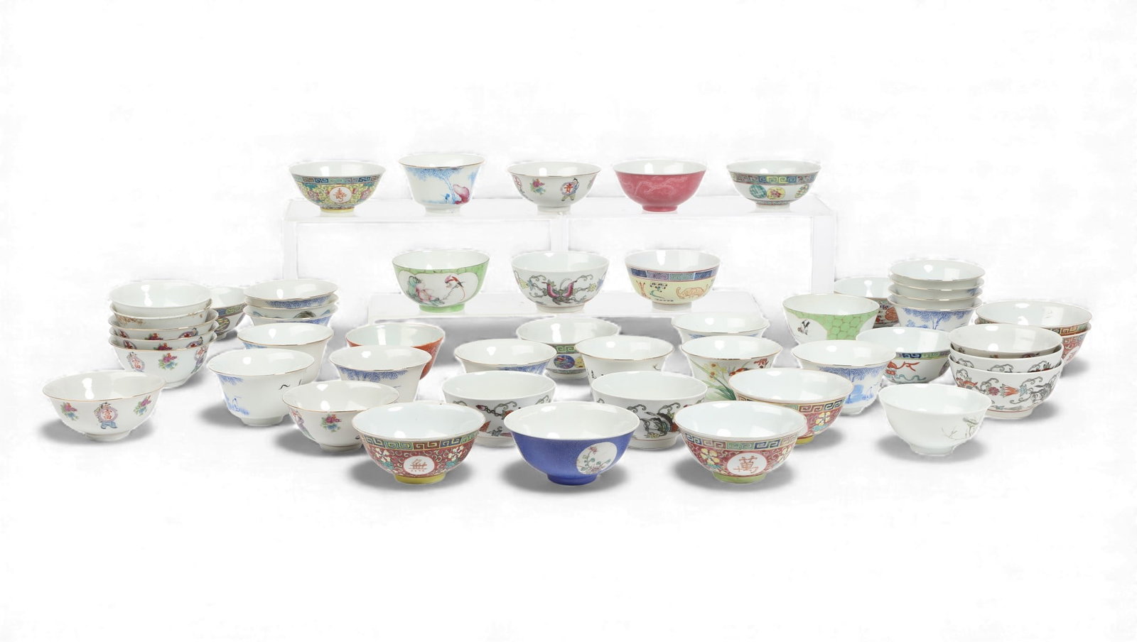 A group of twenty eight Chinese painted bowls: A group of twenty eight Chinese painted bowls Largest: height 4 x diameter 10 in. (10.2 x 25.4 cm.)