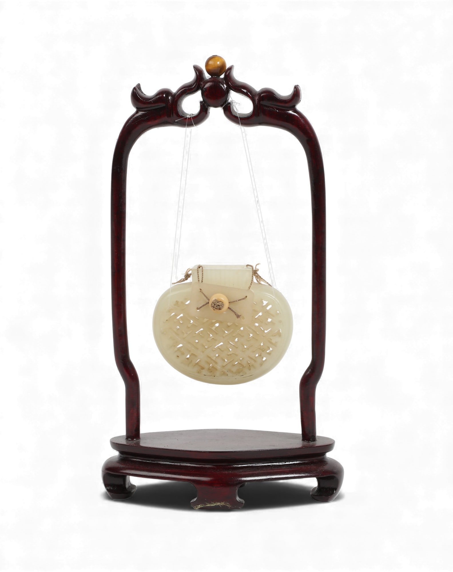 A vintage Chinese carved hardstone ornament on a wooden stand (1 of 2)