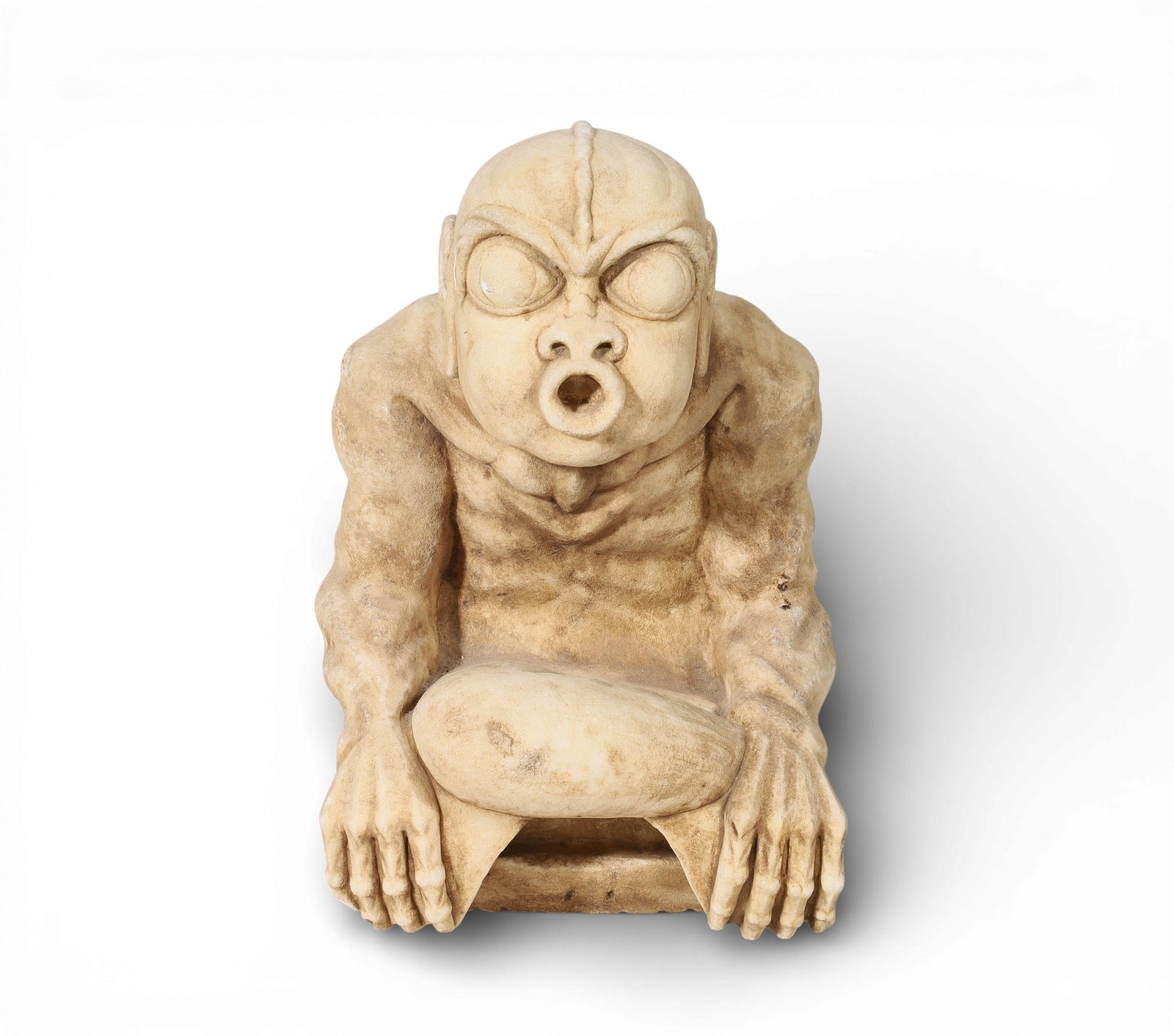 An Asian carved stone model of a grotesque: An Asian carved stone model of a grotesqueheight 11 3/4in (29cm); width 8 1/4in (20.5cm); depth 9in (22.5cm) Provenance:Property from a Private Collection, San Francisco, California.