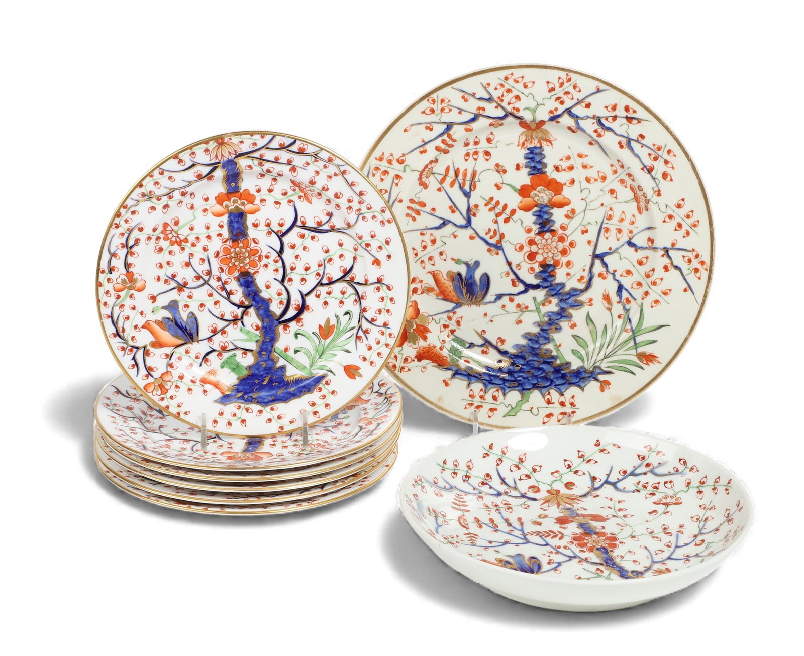 A Royal Crown Derby porcelain Tree of Life part dessert service, date codes for 1806-1825, 1882: A Royal Crown Derby porcelain Tree of Life part dessert servicedate codes for 1806-1825, 1882Comprising six 8in plates, with red stamped factory mark and date code for 1882, and a 10in round cake plat