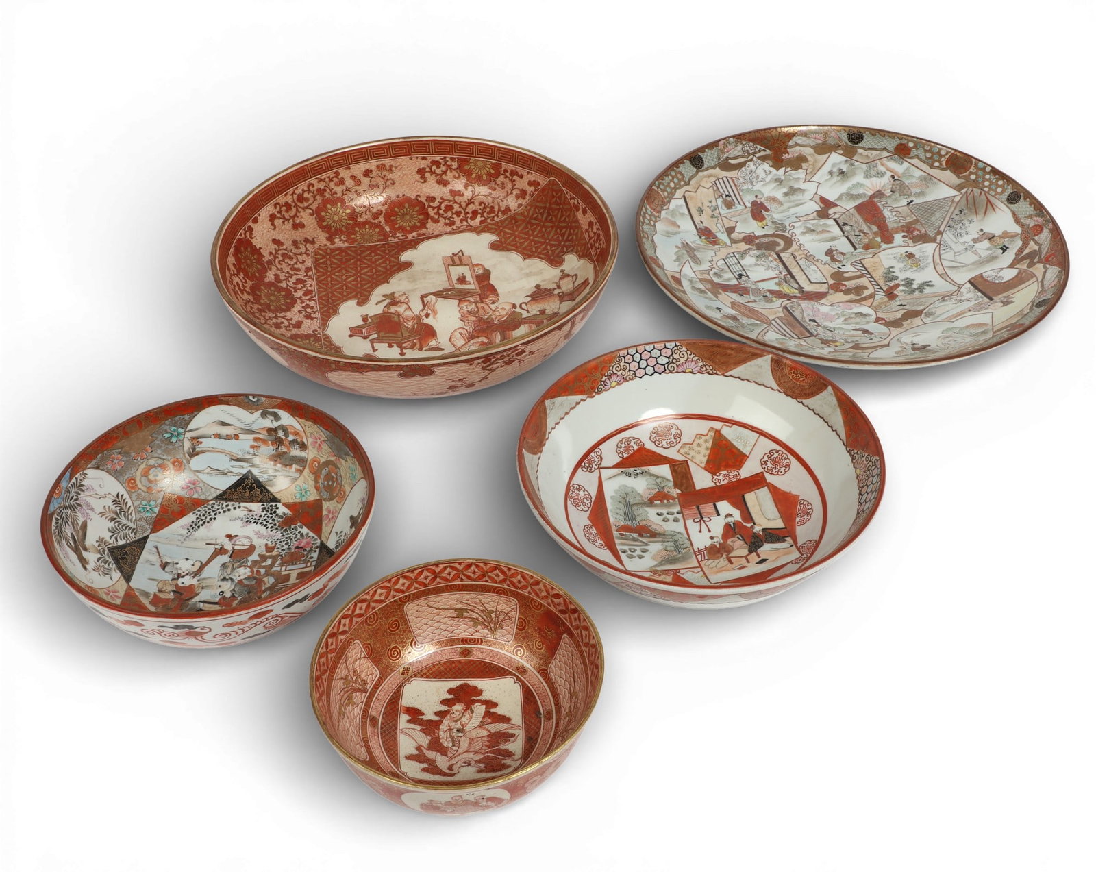 Five Japanese iron red Kutani bowls: Five Japanese iron red Kutani bowls Of varying sizes, each with characters painted to underside. diameters ranging from 6 3/4 to 14 1/4in (17 to 36cm) Provenance: Property from a Private Collection, S