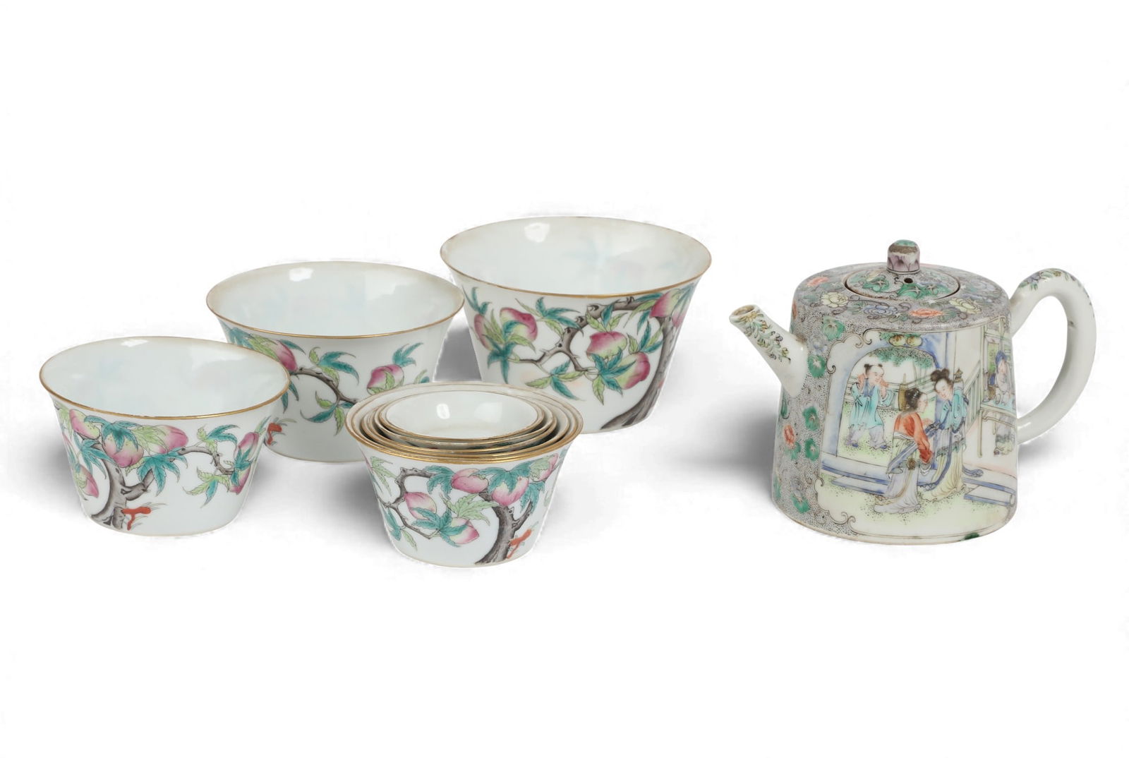 A small Chinese Famille Rose porcelain teapot and set of ten nine peaches nesting bowls: A small Chinese Famille Rose porcelain teapot and set of ten nesting bowls in the nine peaches motifEach with painted red characters to underside. (11)teapot height 4in (10cm); largest diameter 4in (1