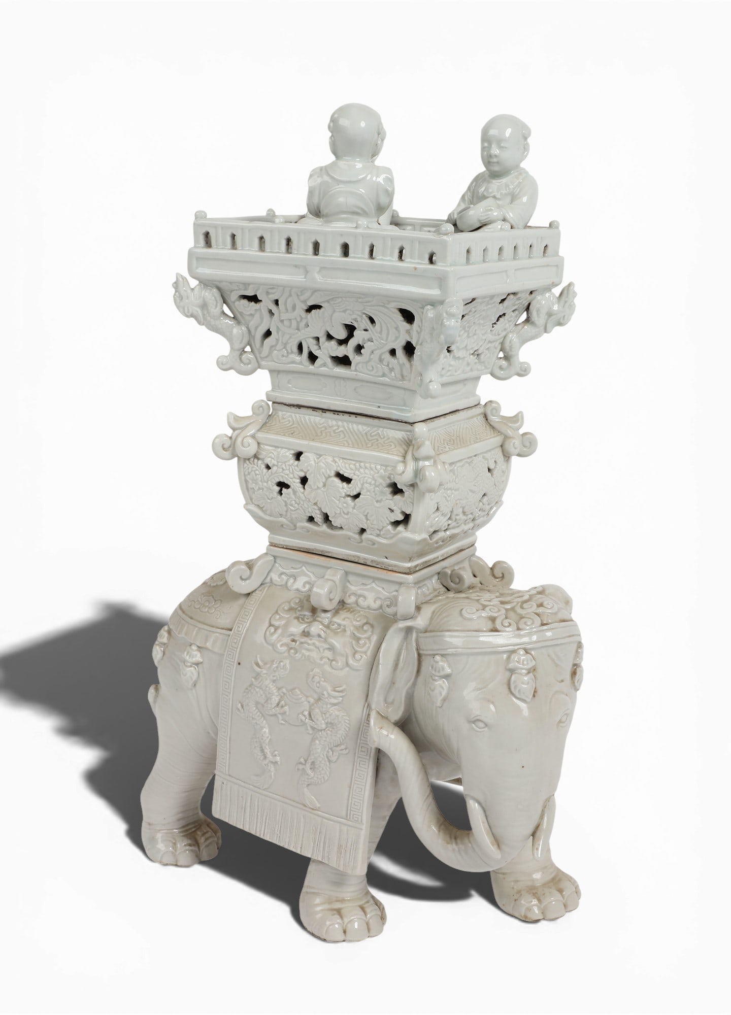A Chinese dehua elephant form censer: A Chinese dehua elephant form censerheight 14 3/4in (37.5cm); width 9 1/4in (23.5cm); depth 5in (13cm) Provenance:Property from a Private Collection, San Francisco, California.