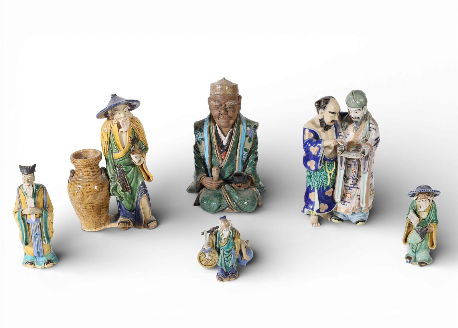 A group of six Asian polychrome glazed ceramic figures and a figural group (1 of 5)