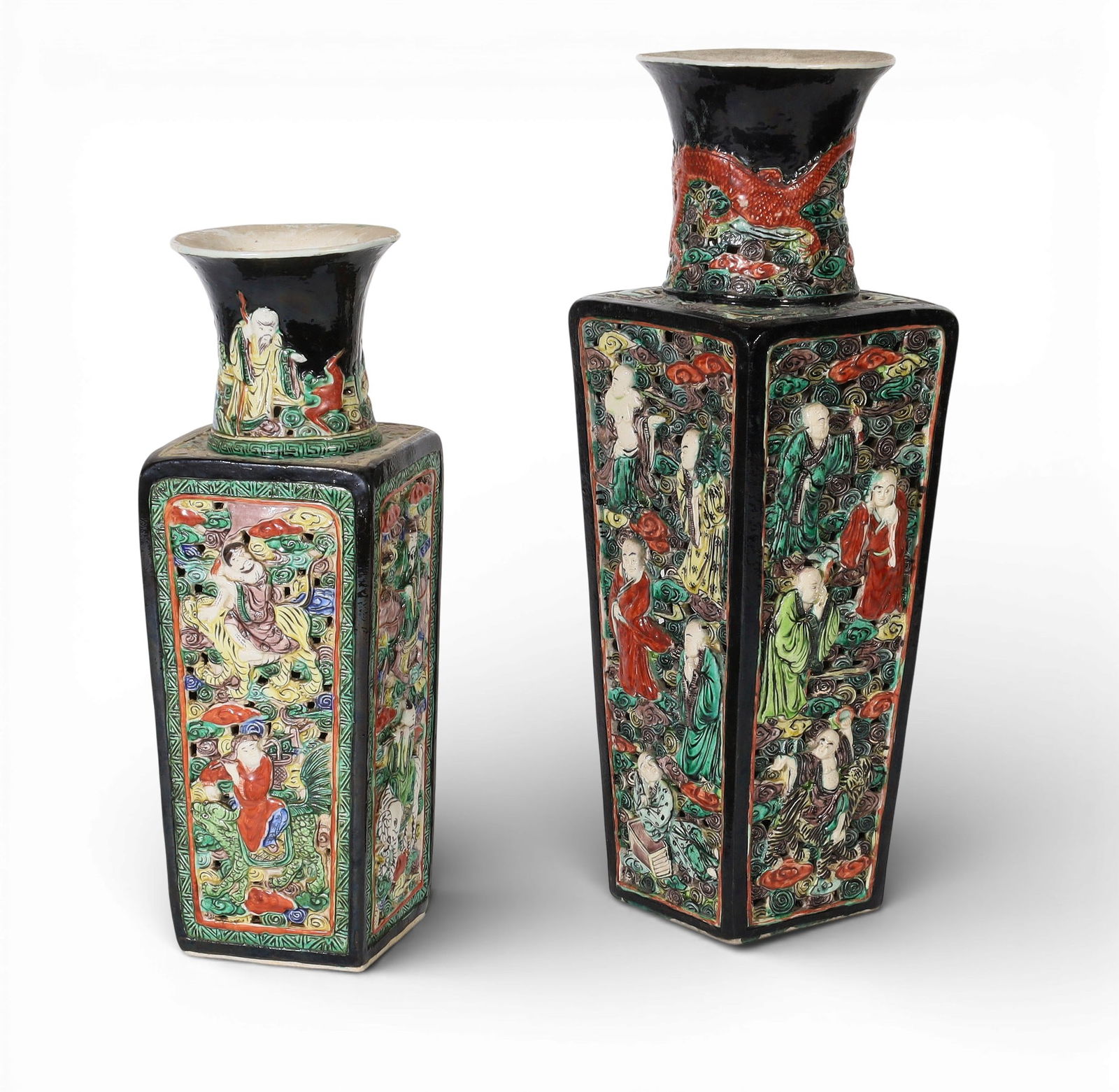 Two Chinese Famille Noir double walled reticulated tapered square porcelain vases: Two Chinese Famille Noir double walled reticulated tapered square porcelain vasesEach with character seal to underside.largest 16 1/2in (42cm); width 5 1/2in (14cm) square Provenance:Property from a
