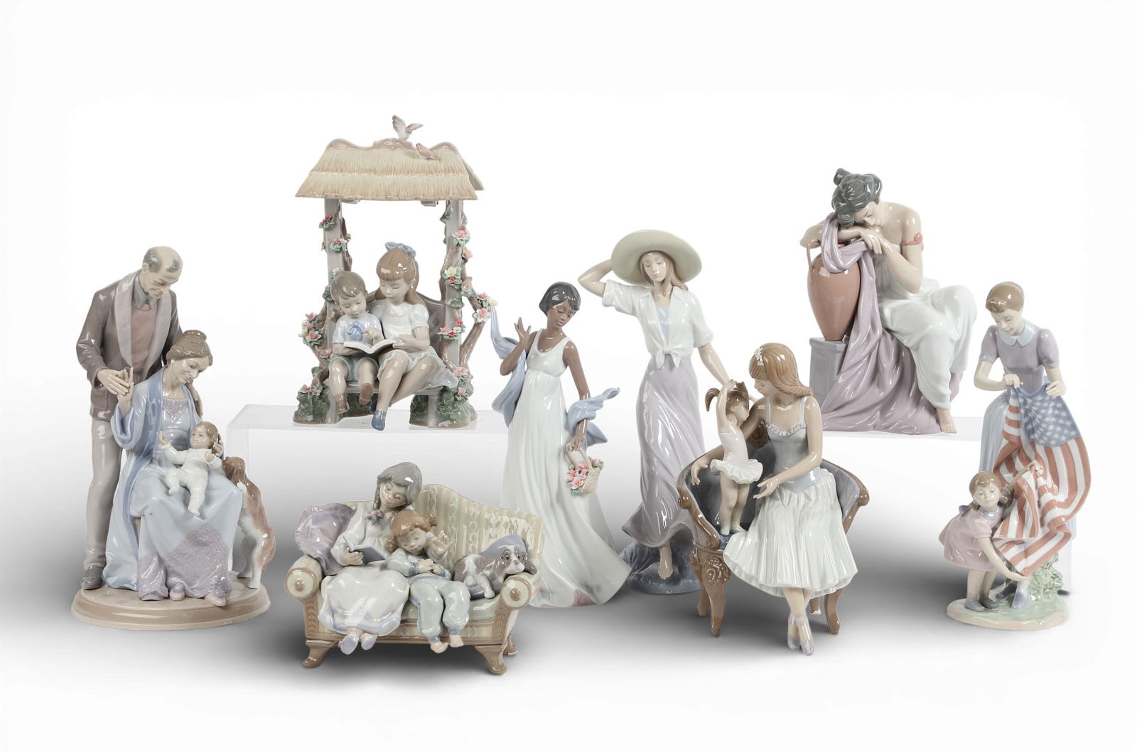 A group of eight Lladro figures (1 of 8)