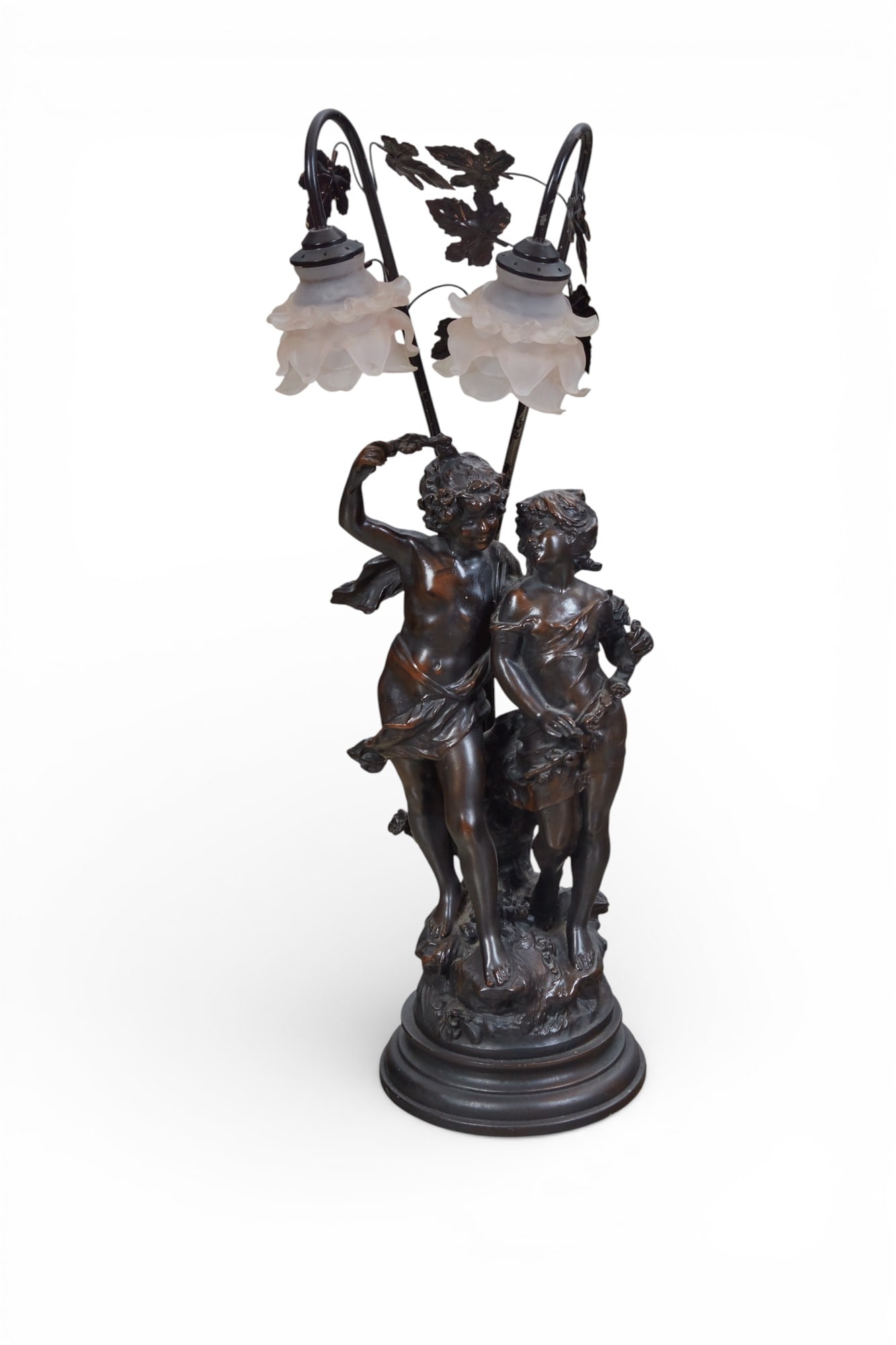 A figural two light table lamp with glass shades: A figural two light table lamp with glass shadesheight 33 x width 8 x depth 8 in. (83.8 x 20.3 x 20.3 cm.)