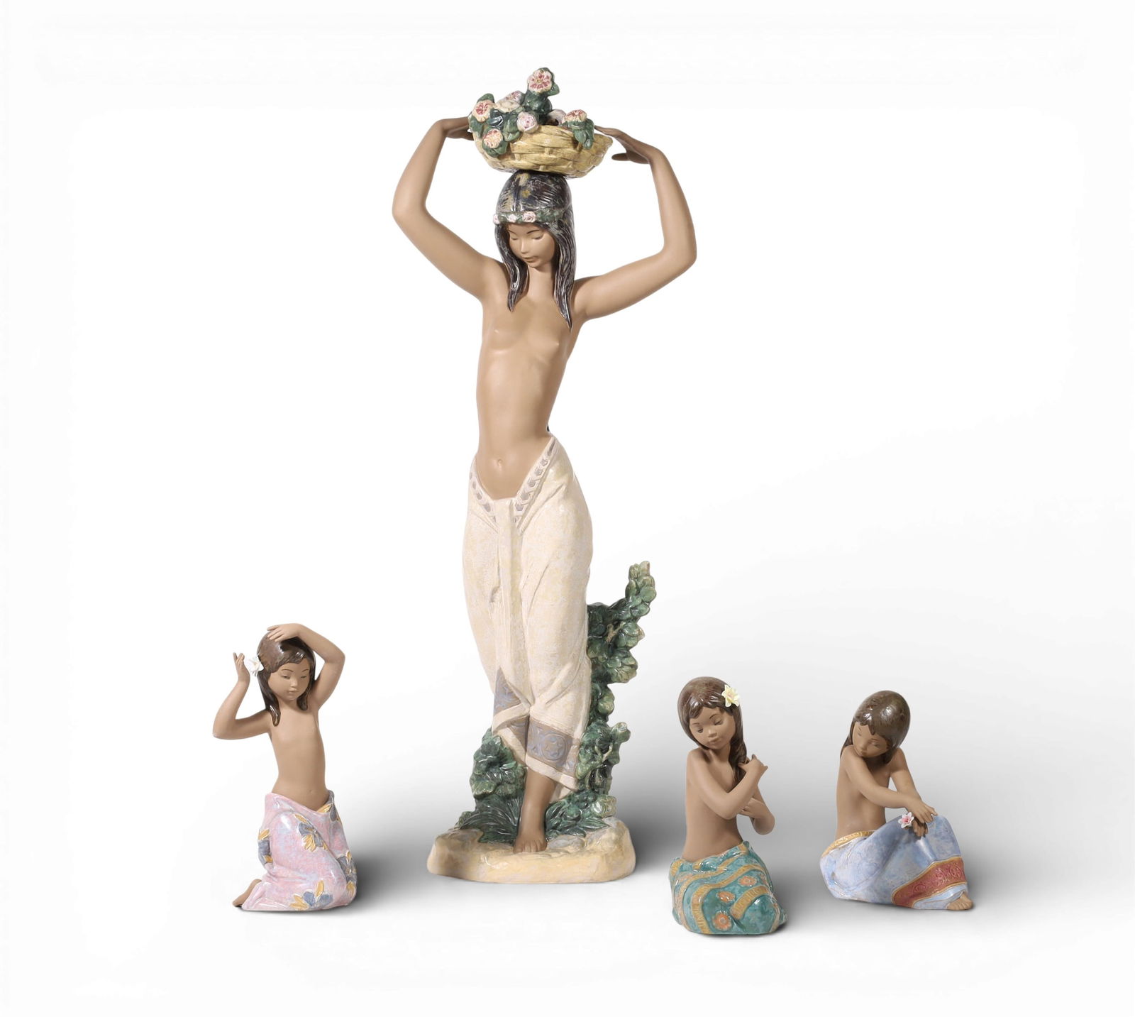 A group of four Lladro figures (1 of 5)