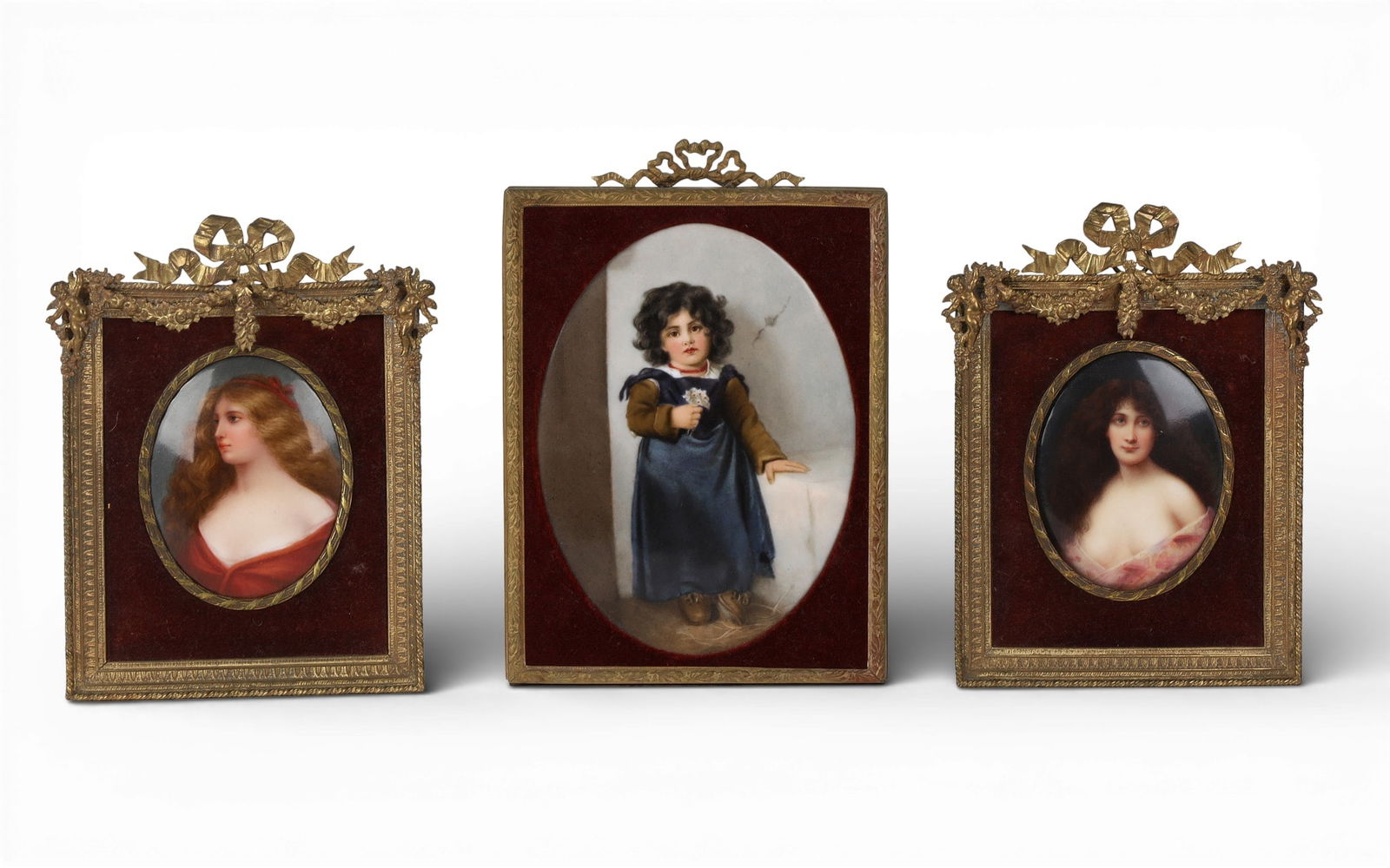 A group of three porcelain plaques in gilt metal frames (1 of 3)