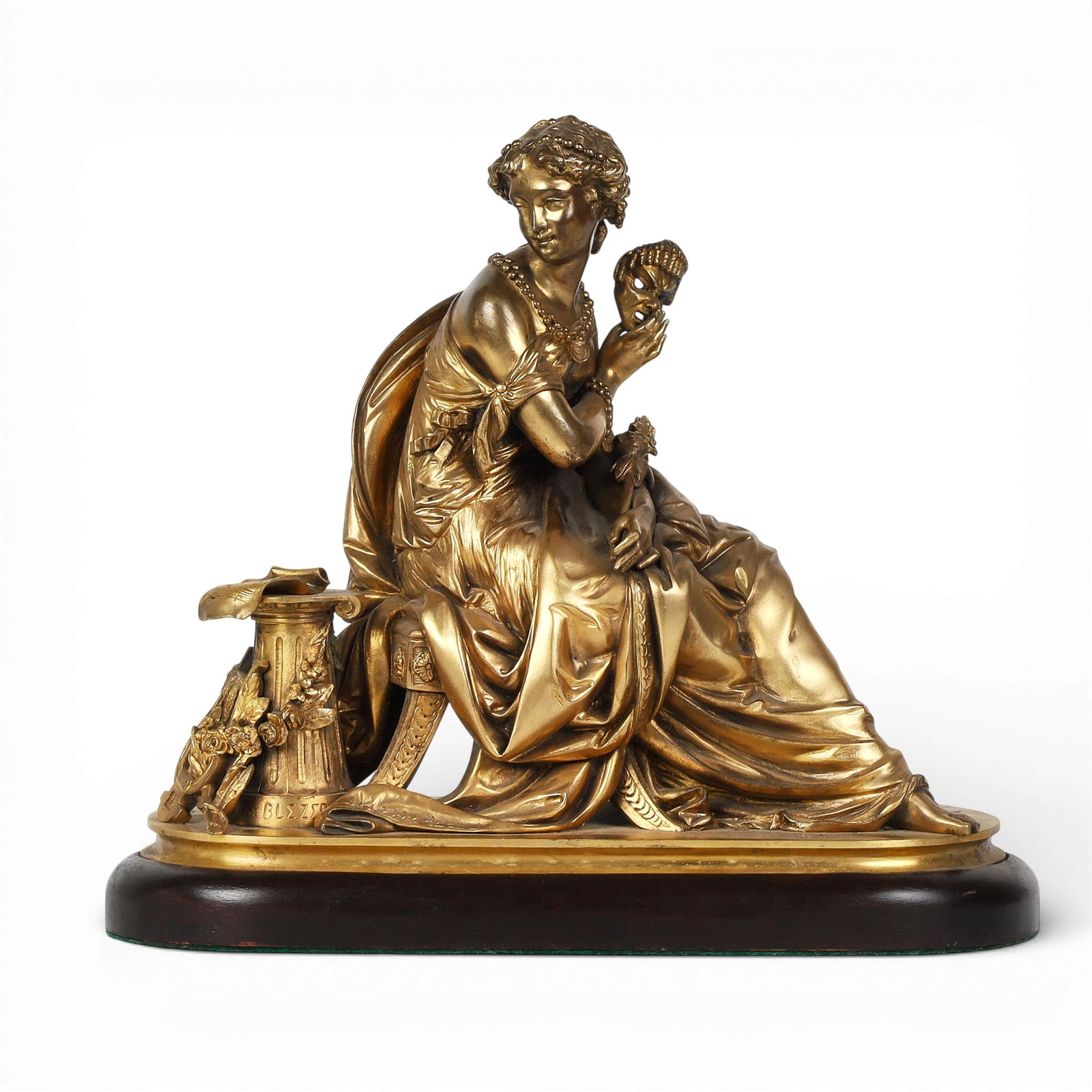 A gilt bronze figure of a seated woman: A gilt bronze figure of a seated womanheight 12 x width 13 1/2 x depth 5 1/2 in. (30.5 x 34.3 x 14 cm.)