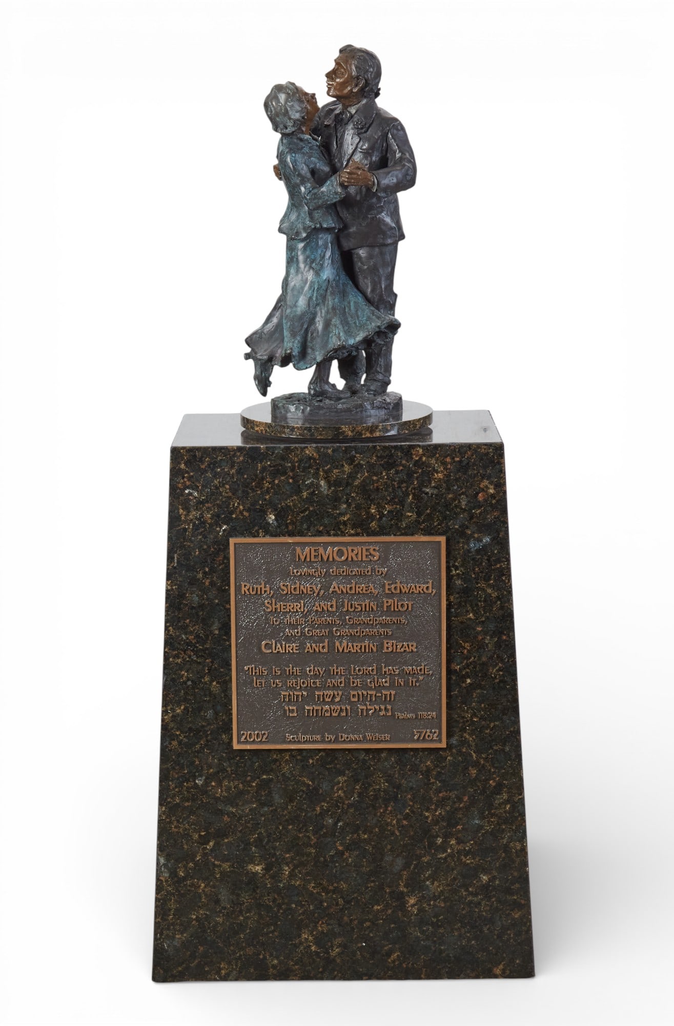 A modern patinated bronze figural group of a dancing couple, Donna Weiser (American, 20th century),: A modern patinated bronze figural group of a dancing couple Donna Weiser (American, 20th century) circa 2002 Incised to skirt D. Weiser / A/P, on rotating circular plinth atop a trapezoidal granite