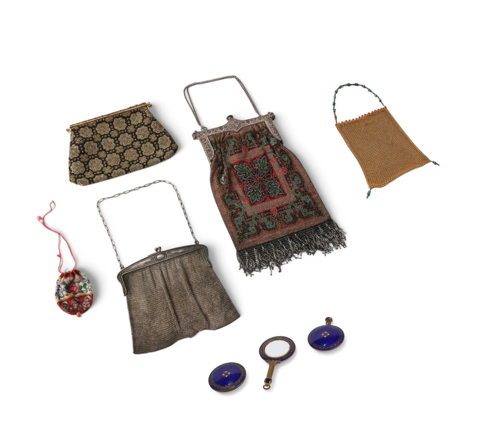 Five Antique mesh and beaded handbags and a three piece enamel vanity set: Five Antique mesh and beaded handbags and a three piece enamel vanity setComprising a German silver mesh purse, a gold tone mesh purse, a beaded coin purse, two beaded handbags and a cobalt enamel sce