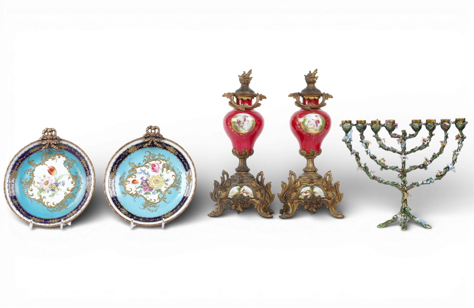 A pair of porcelain and metal covered urns together with a pair of decorative plates with metal: A pair of porcelain and metal covered urns together with a pair of decorative plates with metal border and an enamel metal menorah Urns: height 13 1/2 x width 6 x depth 4 1/2 in. (34.3 x 15.2 x 11.4